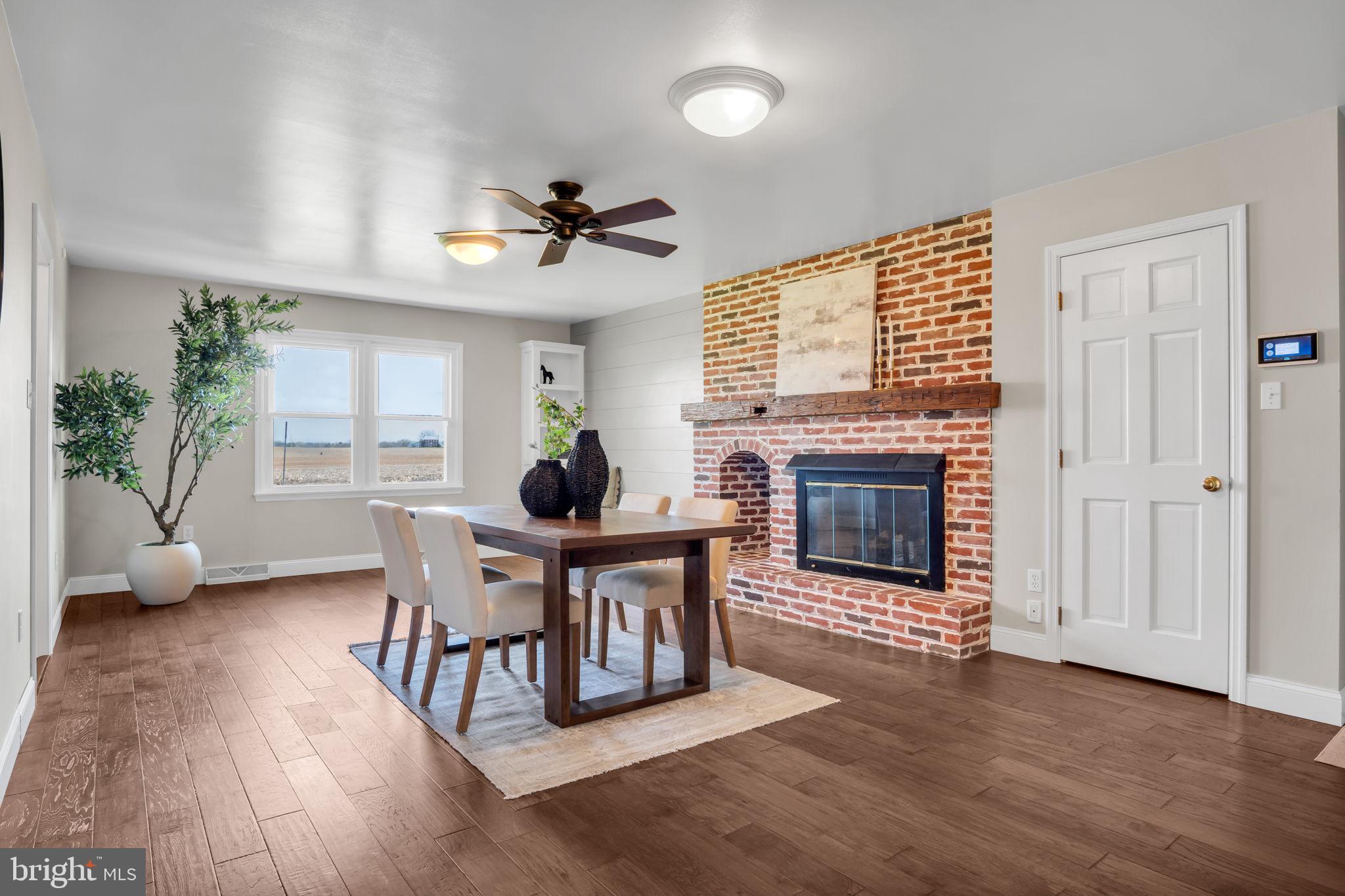 1387 Lutztown Road Boiling Springs, PA 17007 - Photo 16 of 71 Dining area with cozy brick fireplace