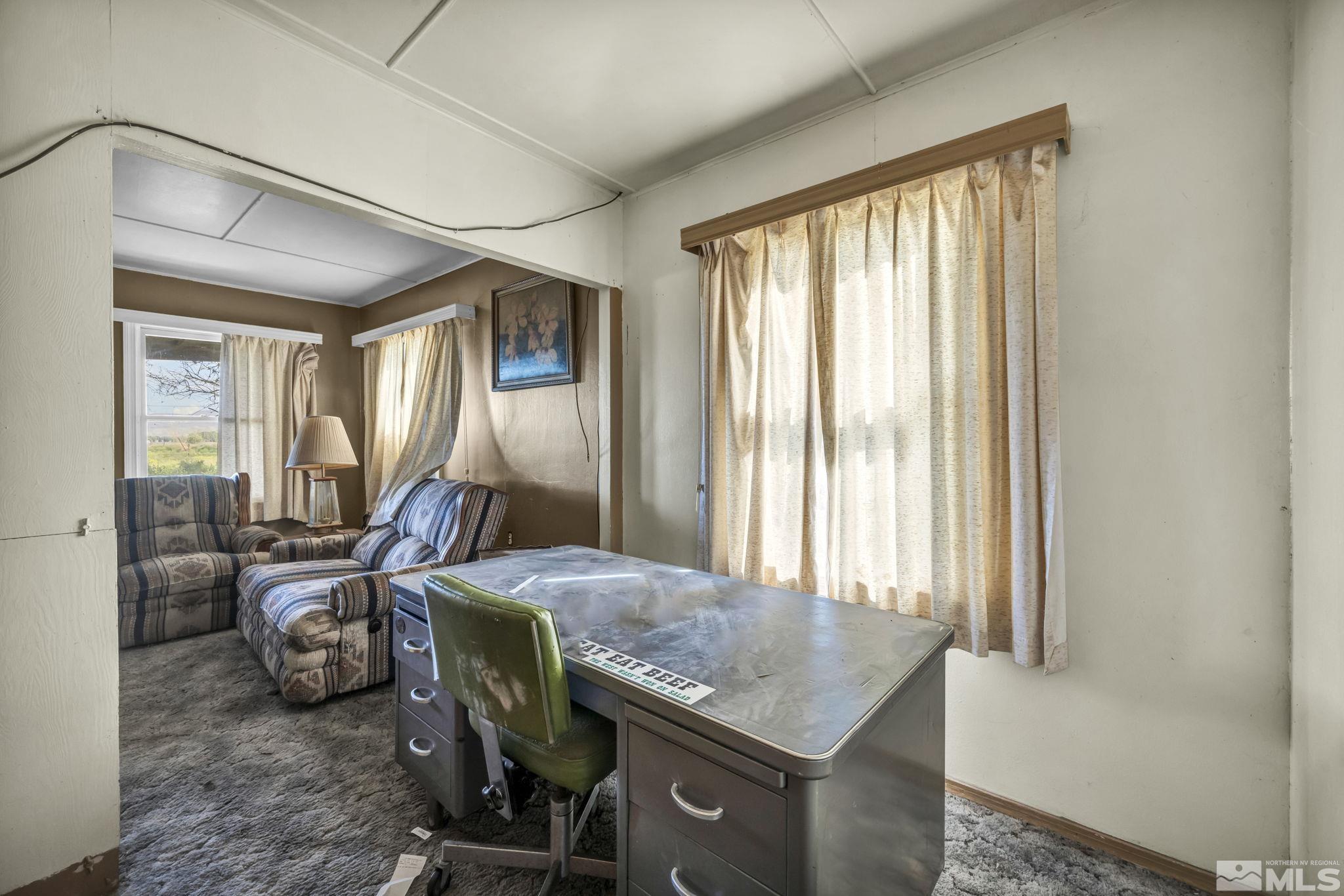 2905 Westfall Road Lovelock, NV 89419 - Photo 12 of 16 a view of a livingroom with furniture and windows