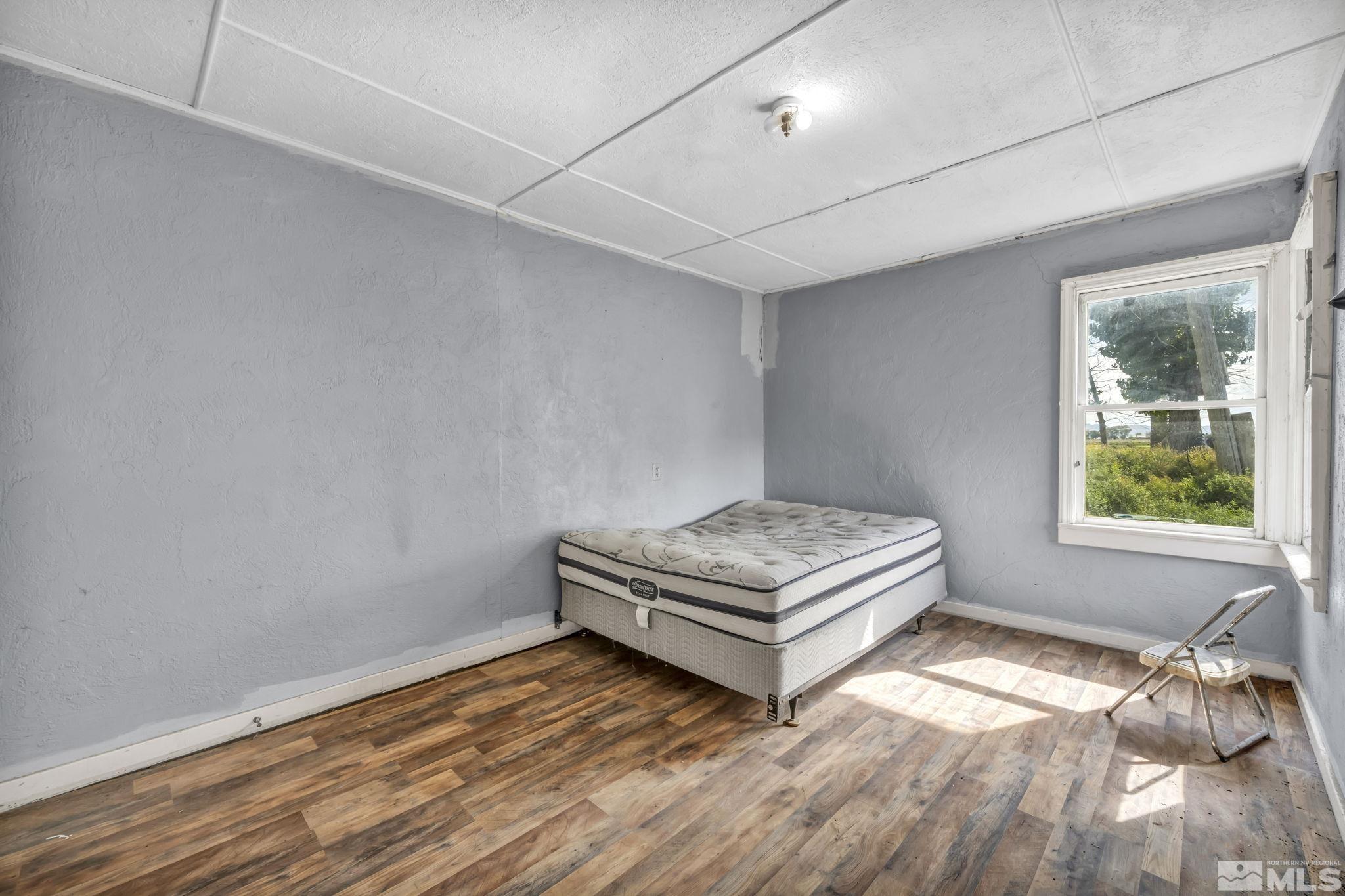 2905 Westfall Road Lovelock, NV 89419 - Photo 13 of 16 a room with a bed and a window