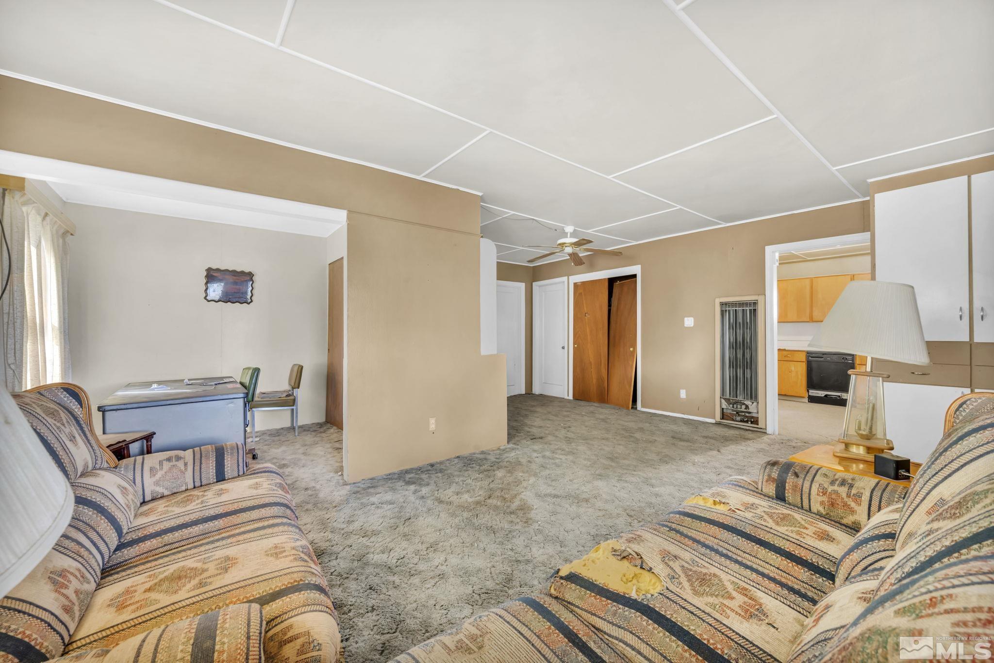 2905 Westfall Road Lovelock, NV 89419 - Photo 7 of 16 a bedroom with a bed and wooden floor