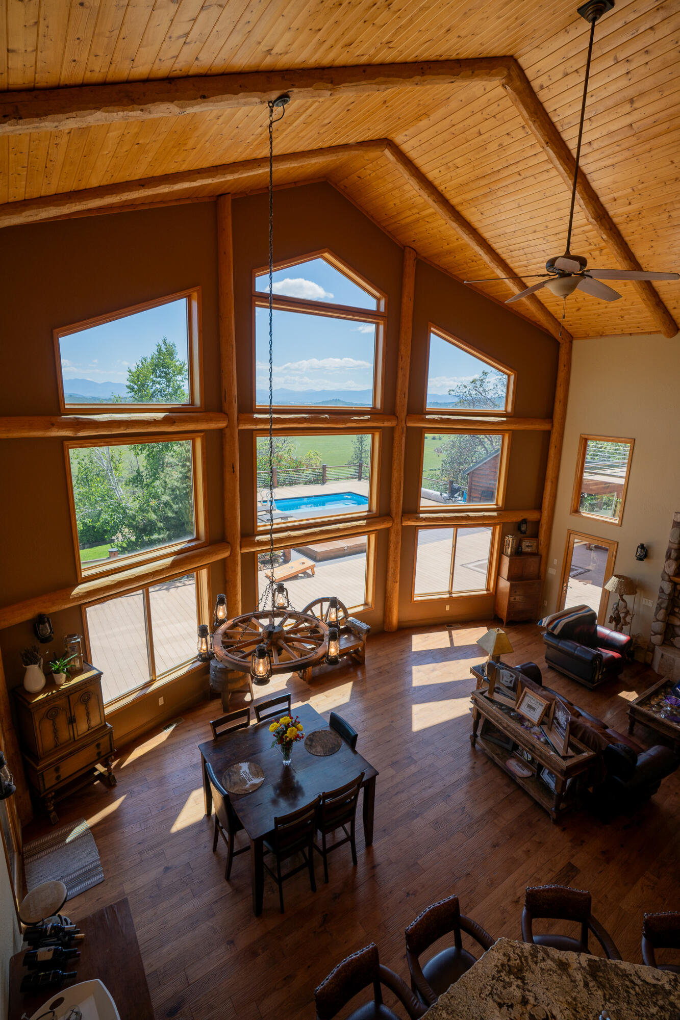 1881 Brophy Road Eagle Point, OR 97524 - Photo 70 of 130 a living room with furniture a wooden floor and a large window