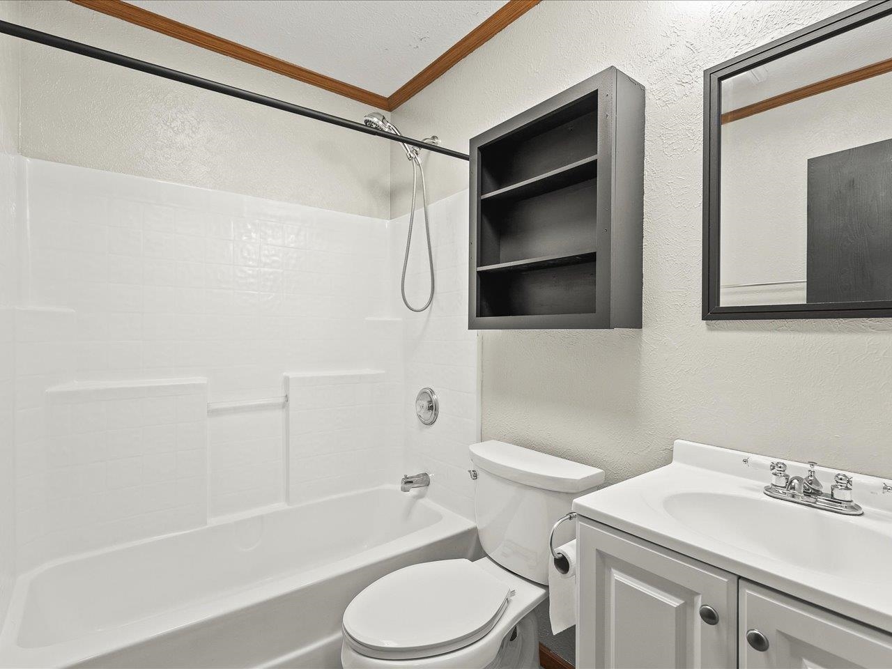 8686 Dutch Elm Court Roscoe, IL 61073 - Photo 25 of 33 a bathroom with a sink toilet and shower