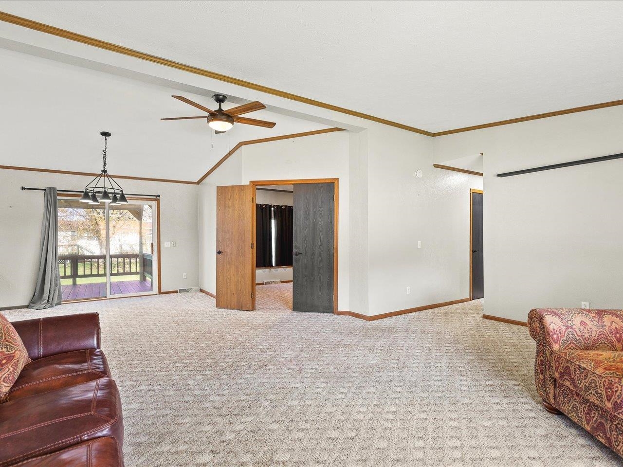 8686 Dutch Elm Court Roscoe, IL 61073 - Photo 7 of 33 a view of livingroom with furniture and windows
