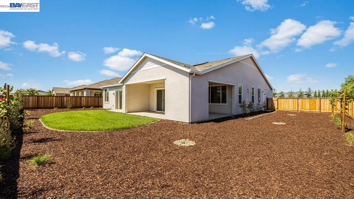 756 Conrad Street Manteca, CA 95336 - Photo 27 of 41 a view of a house with a yard