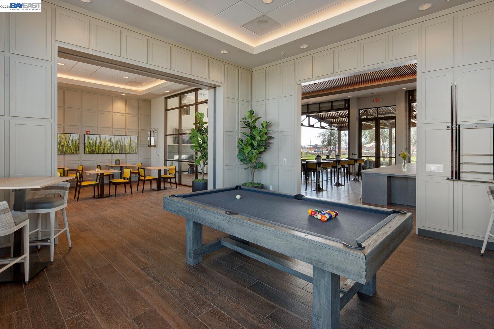 756 Conrad Street Manteca, CA 95336 - Photo 33 of 41 a view of a dining room with furniture window and wooden floor