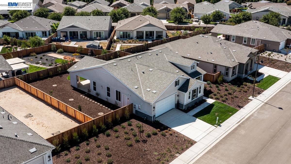 756 Conrad Street Manteca, CA 95336 - Photo 39 of 41 an aerial view of a houses with street