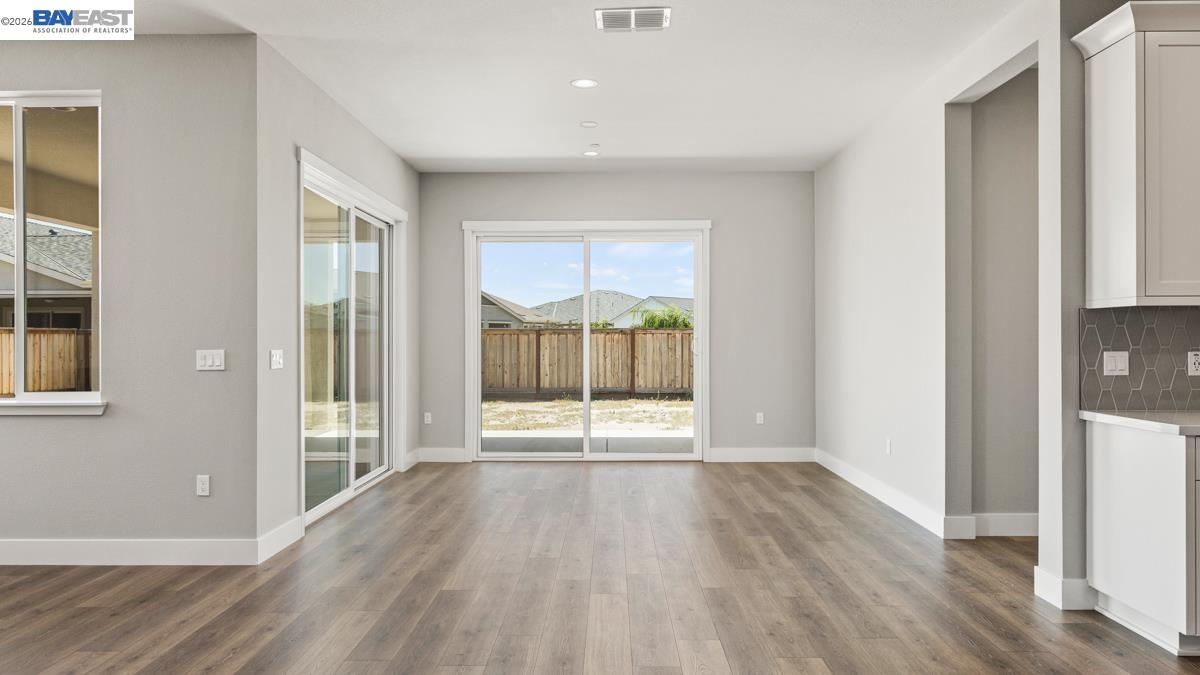 756 Conrad Street Manteca, CA 95336 - Photo 10 of 41 a view of entryway with wooden floor