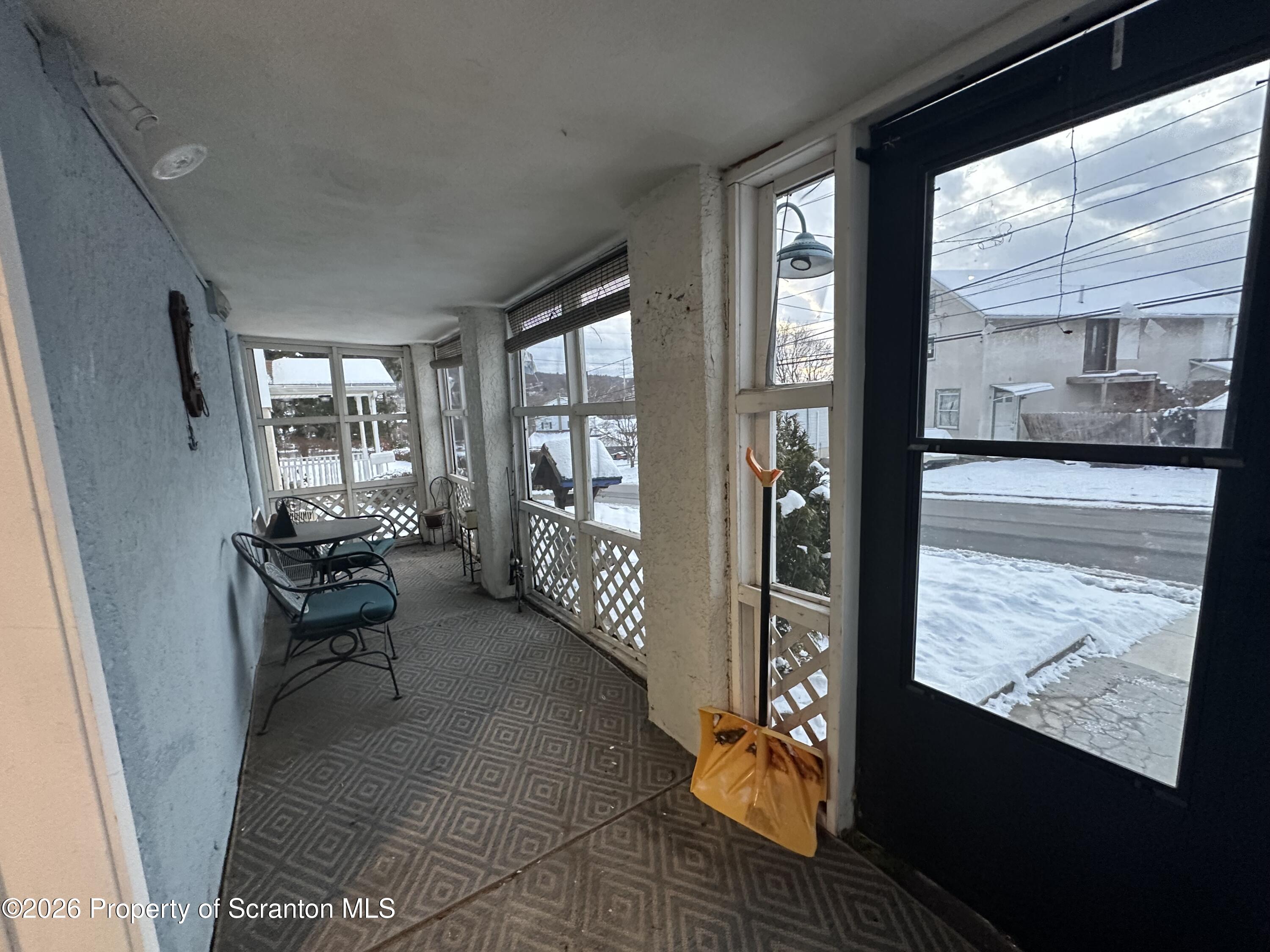 611 Chestnut Street Dunmore, PA 18512 - Photo 23 of 27 a living room with furniture and a large window