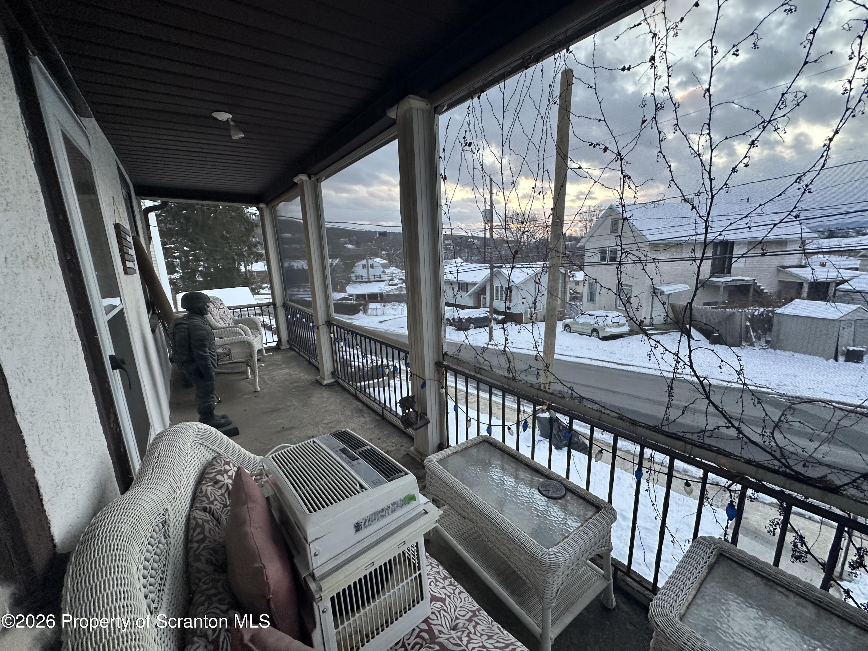 611 Chestnut Street Dunmore, PA 18512 - Photo 24 of 27 a view of a patio with couches table and chairs