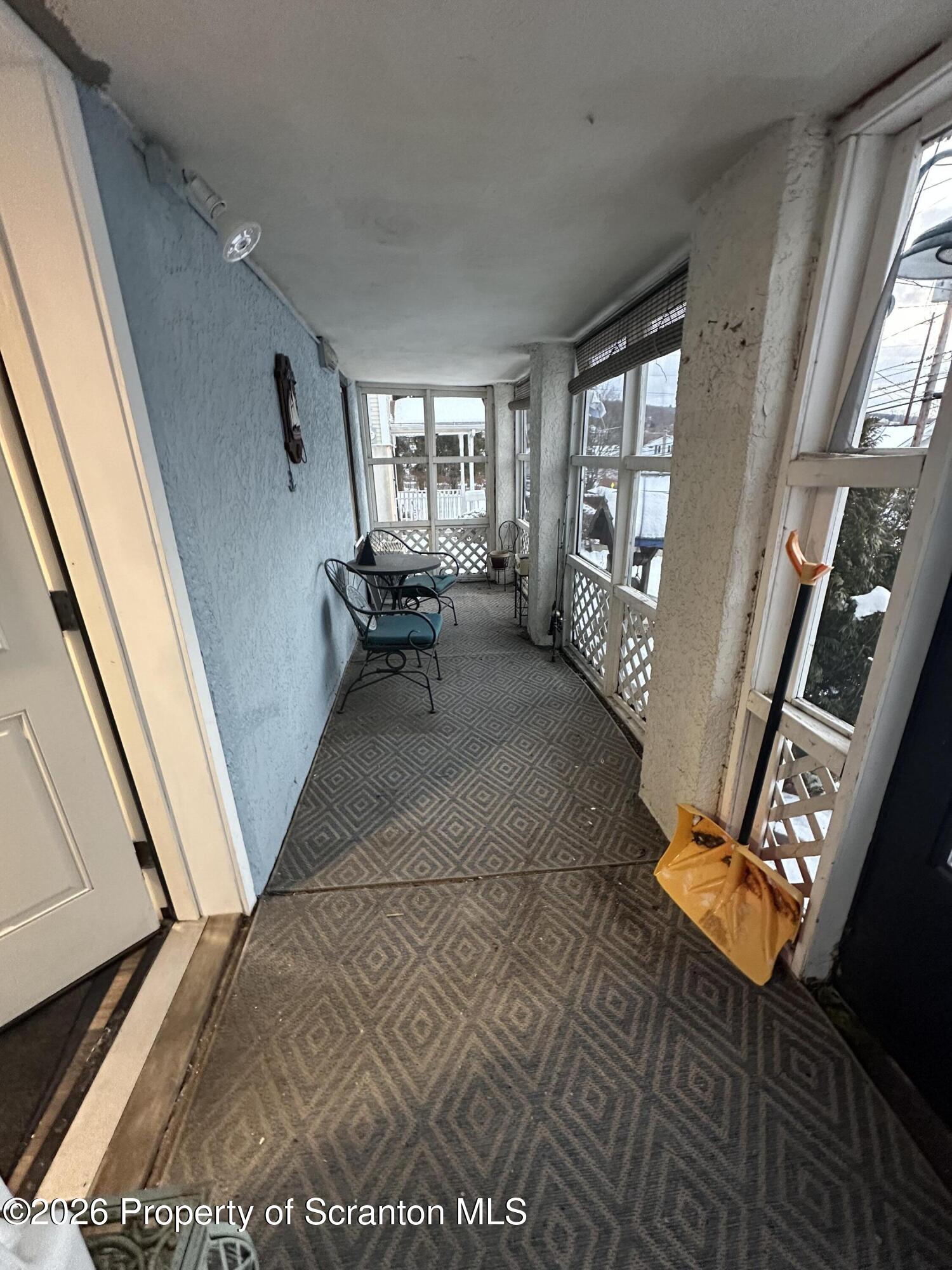 611 Chestnut Street Dunmore, PA 18512 - Photo 25 of 27 a living room with furniture and a window
