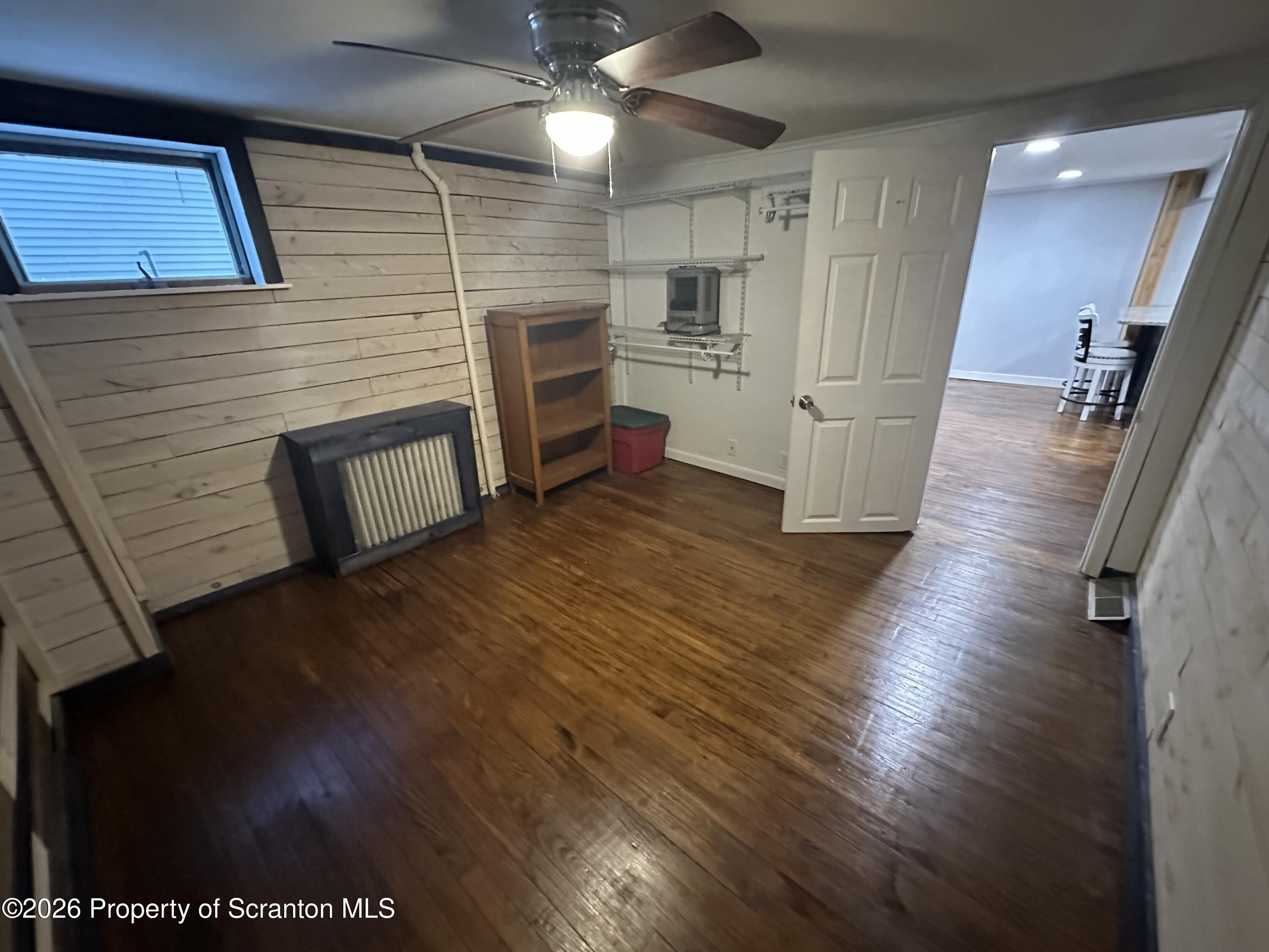 611 Chestnut Street Dunmore, PA 18512 - Photo 9 of 27 a view of a livingroom with wooden floor