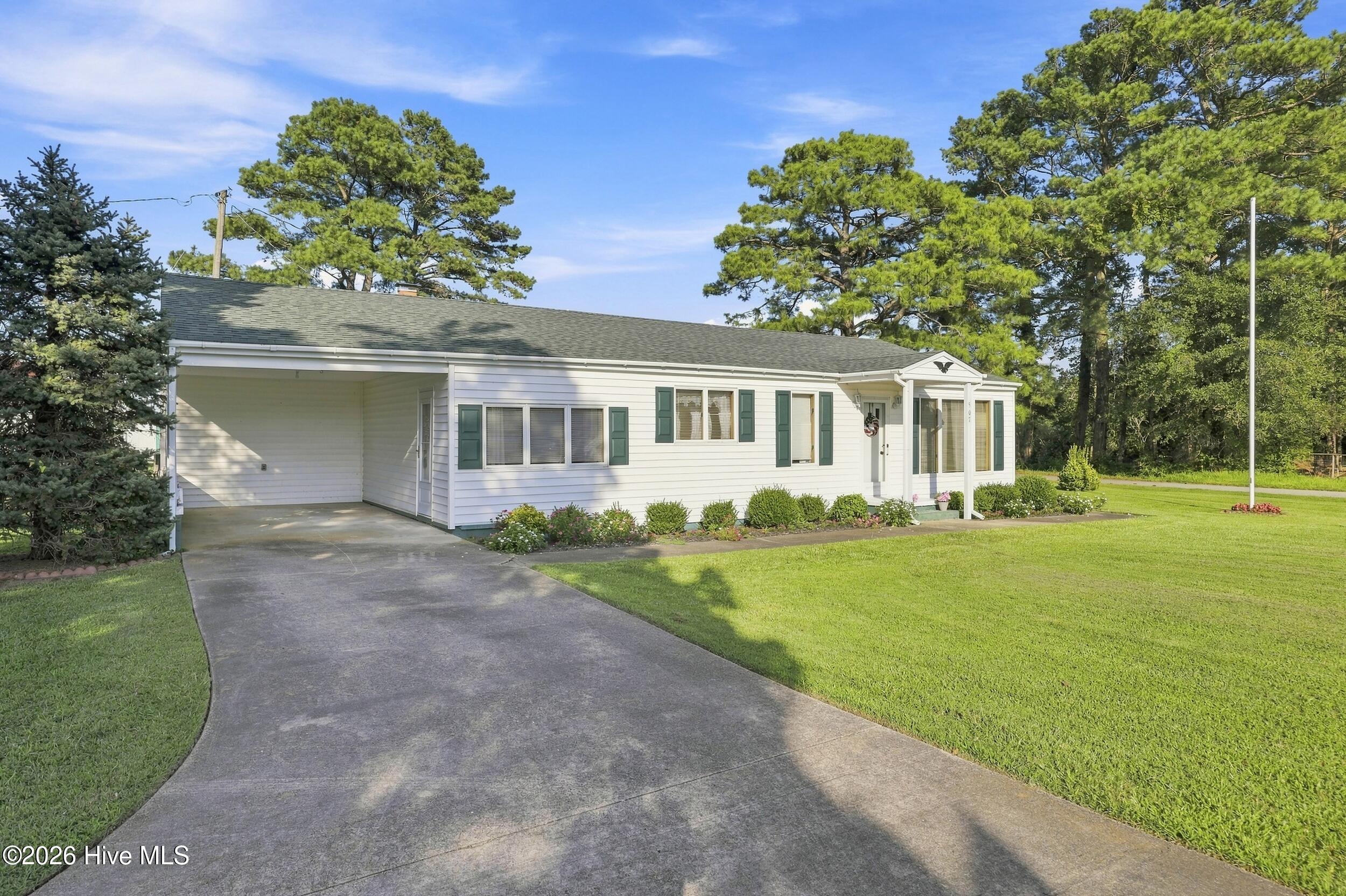 507 Narrow Shore Road Aydlett, NC 27916 - Photo 2 of 39 507 front showing carport