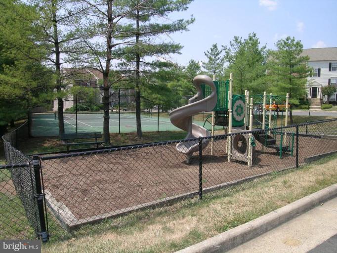 131 Fort Evans Road Southeast, Unit C Leesburg, VA 20175 - Photo 10 of 13 a view of a park with swings