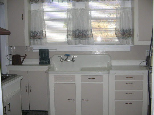 321 South 2nd Street Rochelle, IL 61068 - Photo 4 of 8 a kitchen with a sink and cabinets