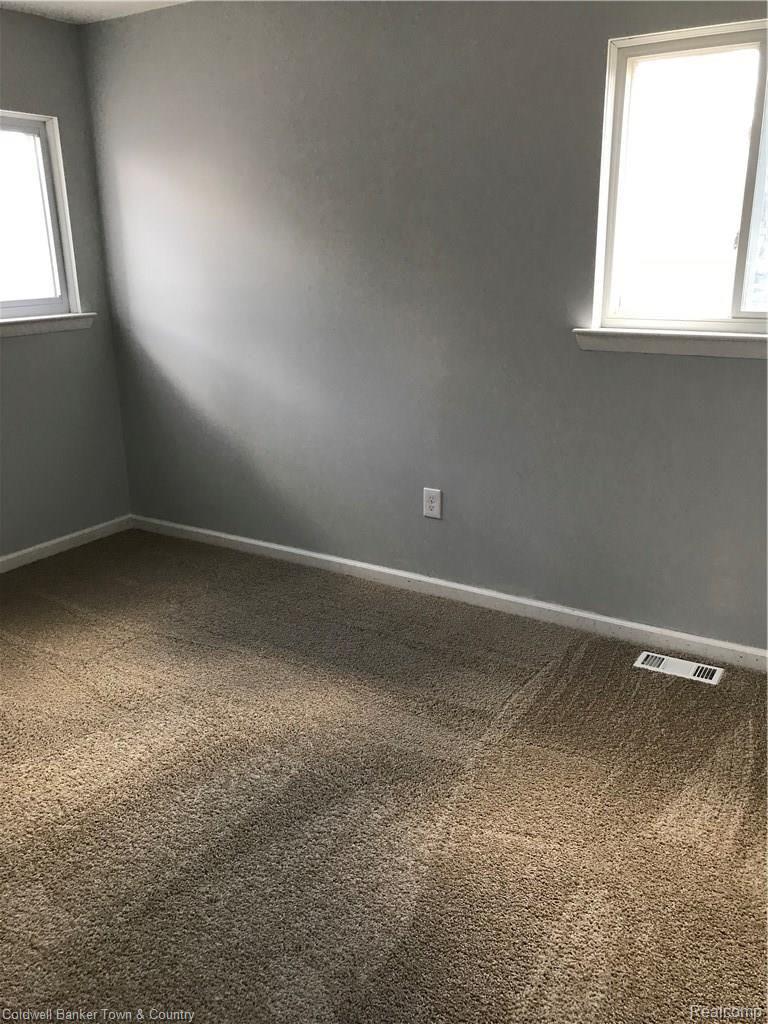26808 Five Mile Road Redford, MI 48239 - Photo 14 of 18 BEDROOM W/ NEW PAINT AND CARPET