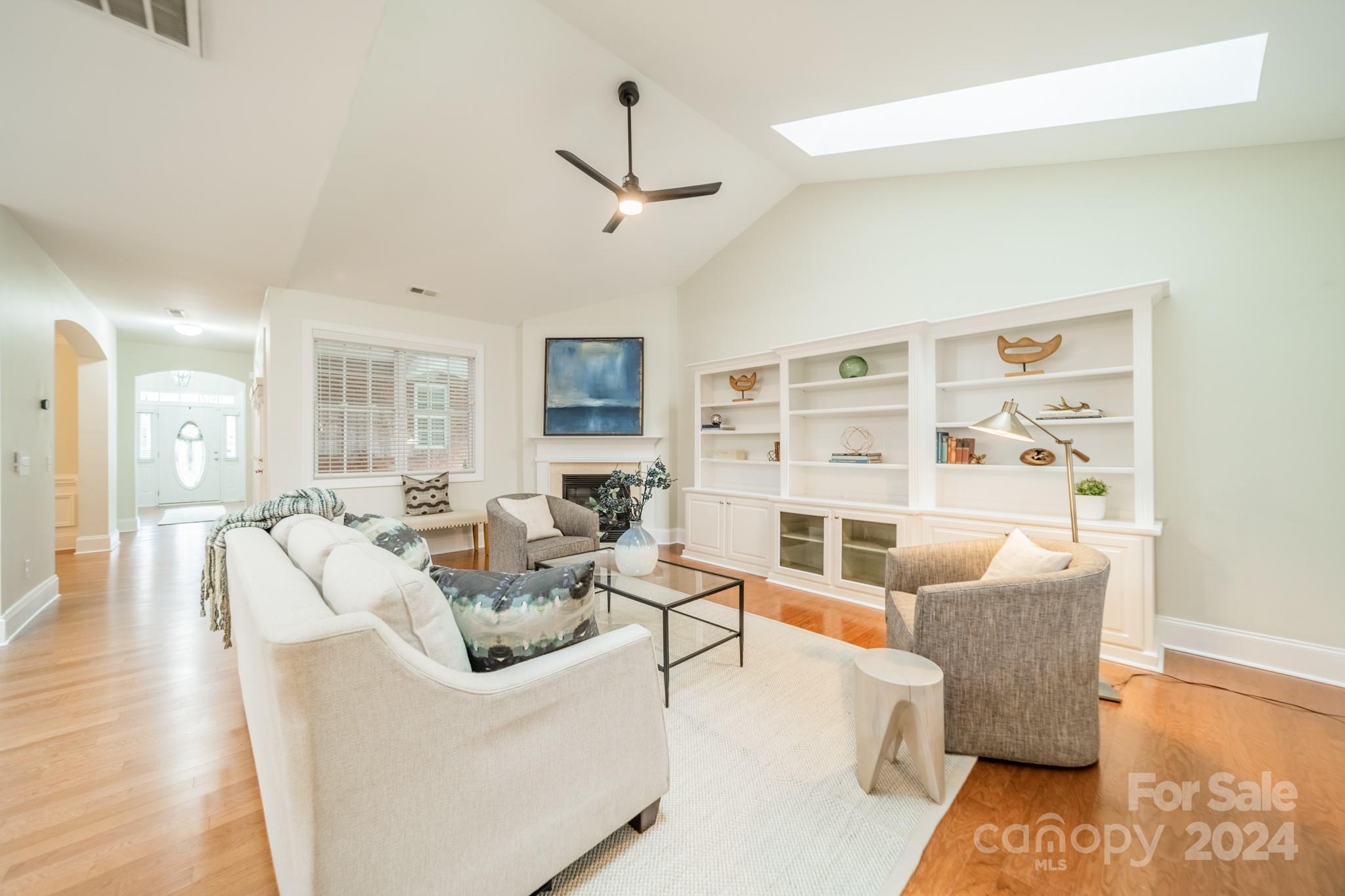 10806 Round Rock Road Charlotte, NC 28277 - Photo 15 of 41 a living room with furniture and a large window
