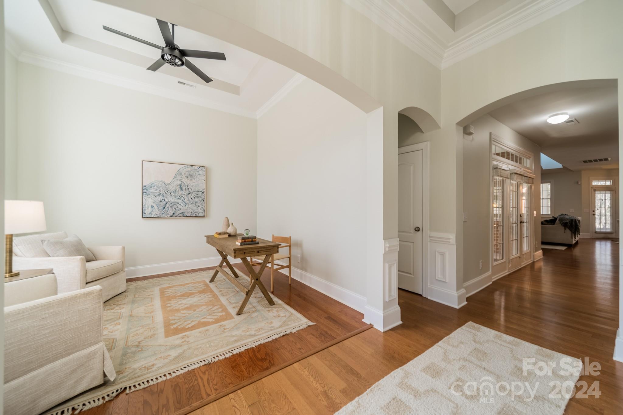 10806 Round Rock Road Charlotte, NC 28277 - Photo 2 of 41 a living room with furniture and a wooden floor