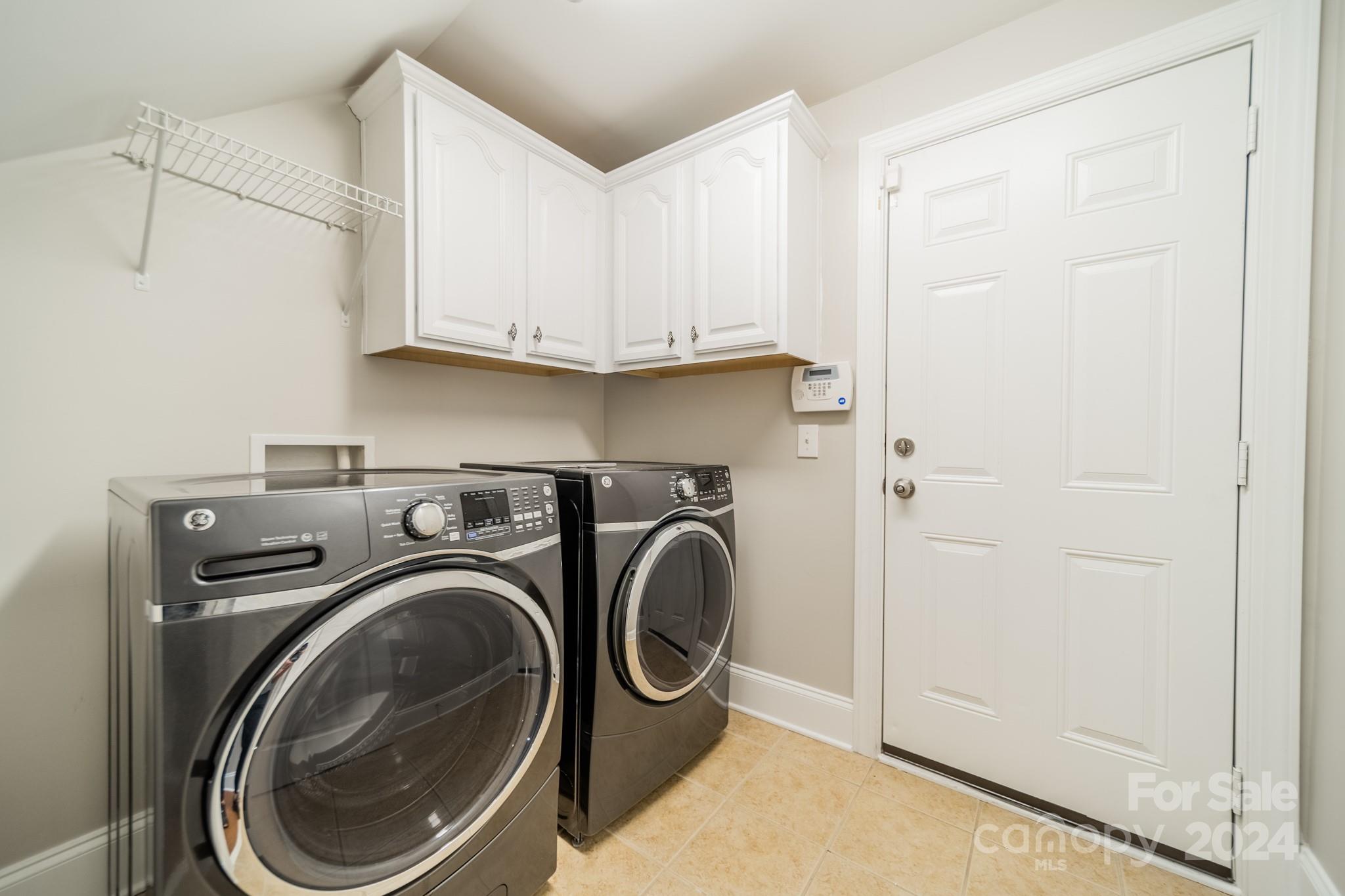 10806 Round Rock Road Charlotte, NC 28277 - Photo 28 of 41 a utility room with dryer and washer