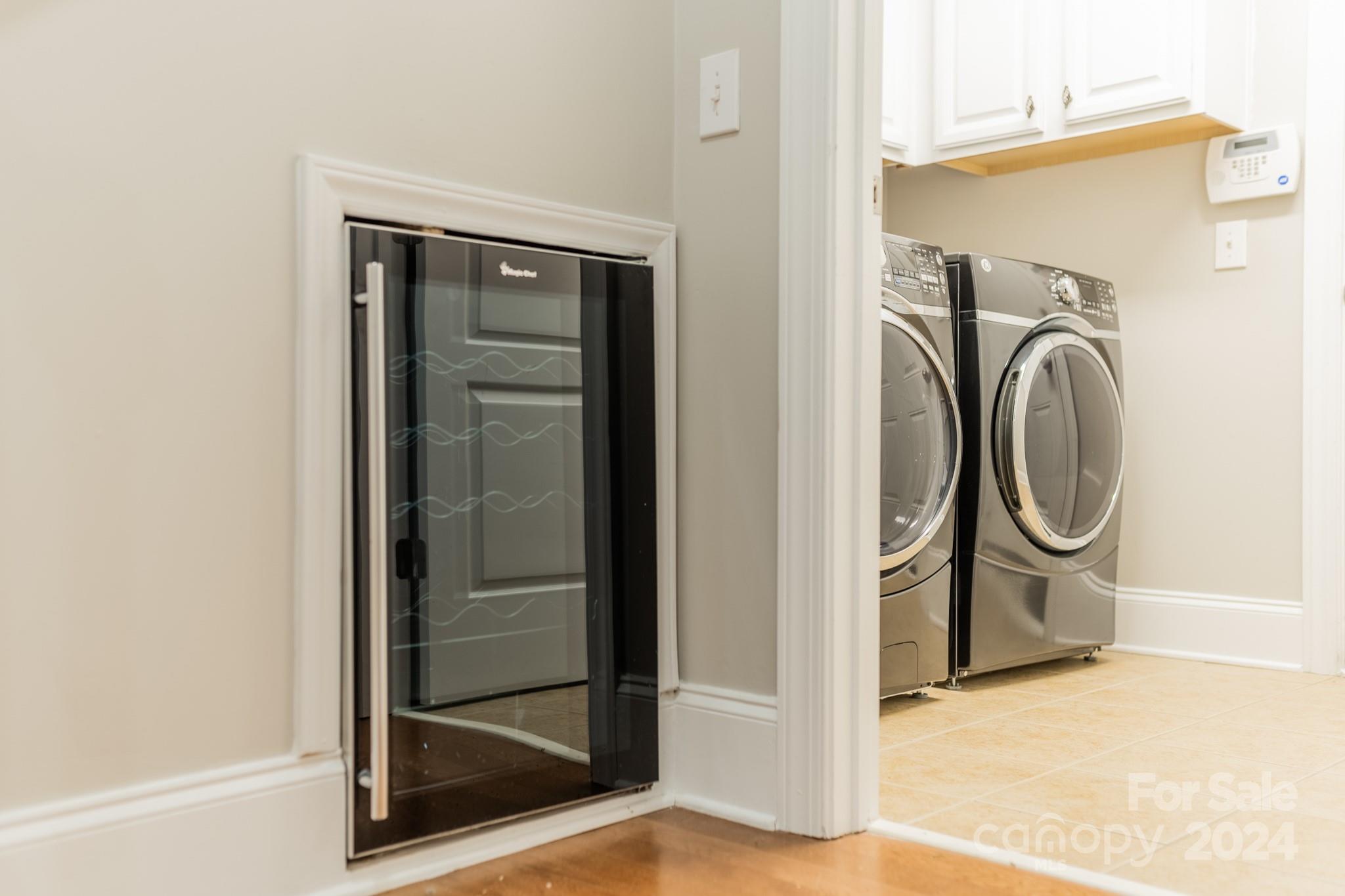 10806 Round Rock Road Charlotte, NC 28277 - Photo 29 of 41 a view of a storage & utility room with washer and dryer