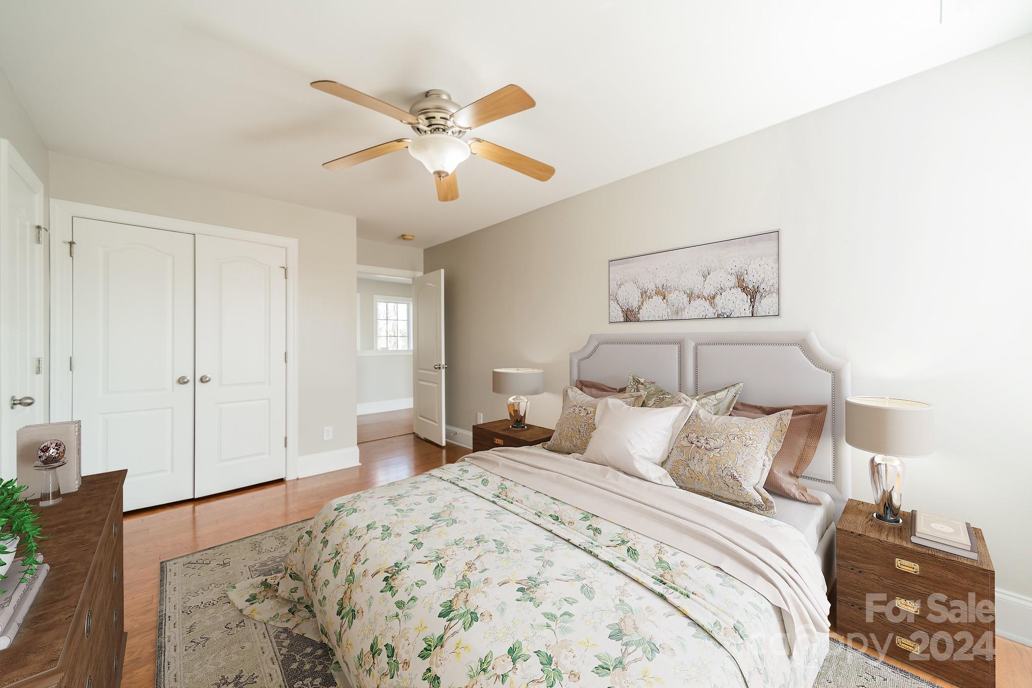 10806 Round Rock Road Charlotte, NC 28277 - Photo 31 of 41 a bedroom with a bed and a chandelier