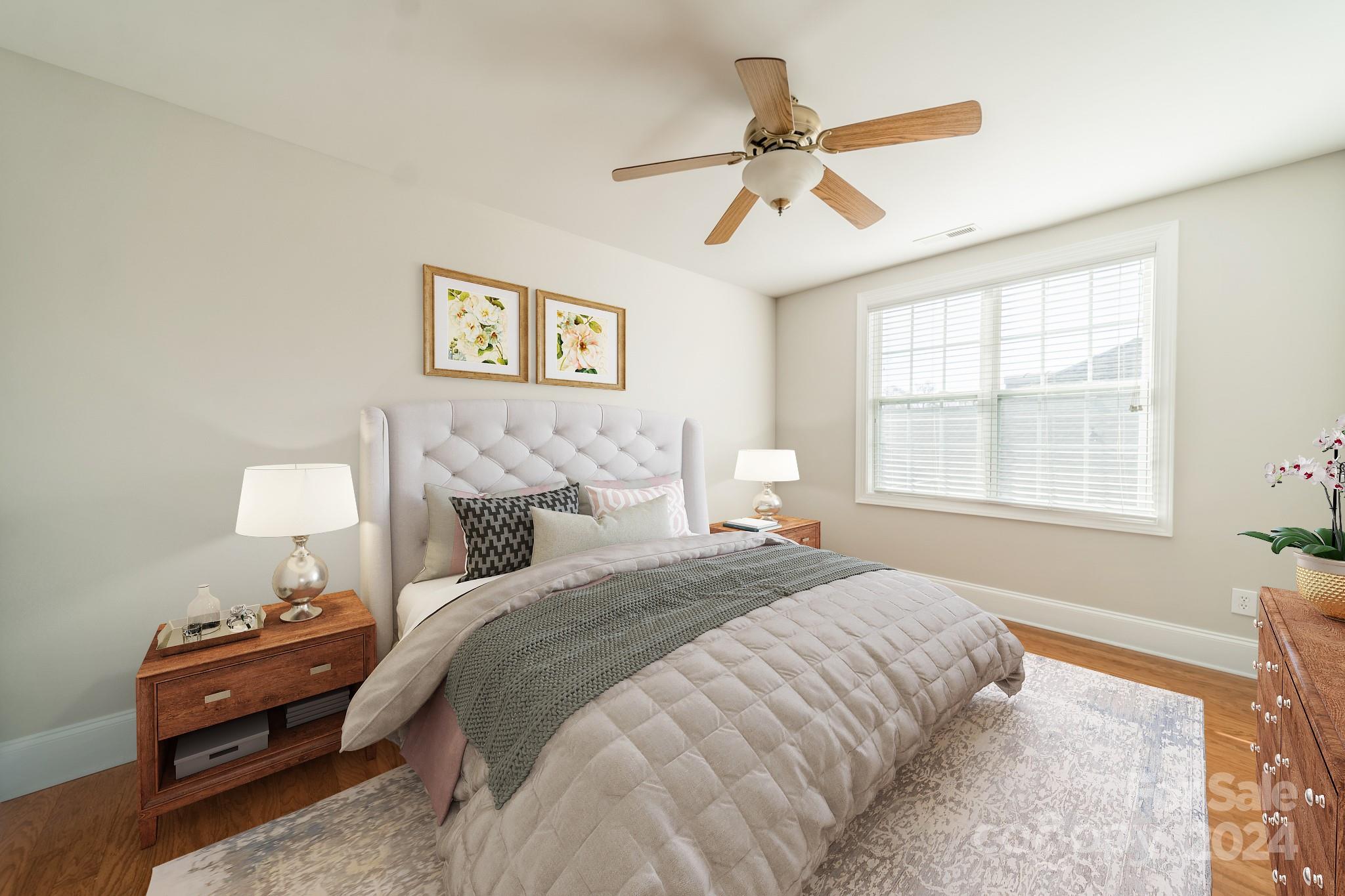 10806 Round Rock Road Charlotte, NC 28277 - Photo 34 of 41 a bedroom with a bed and a window