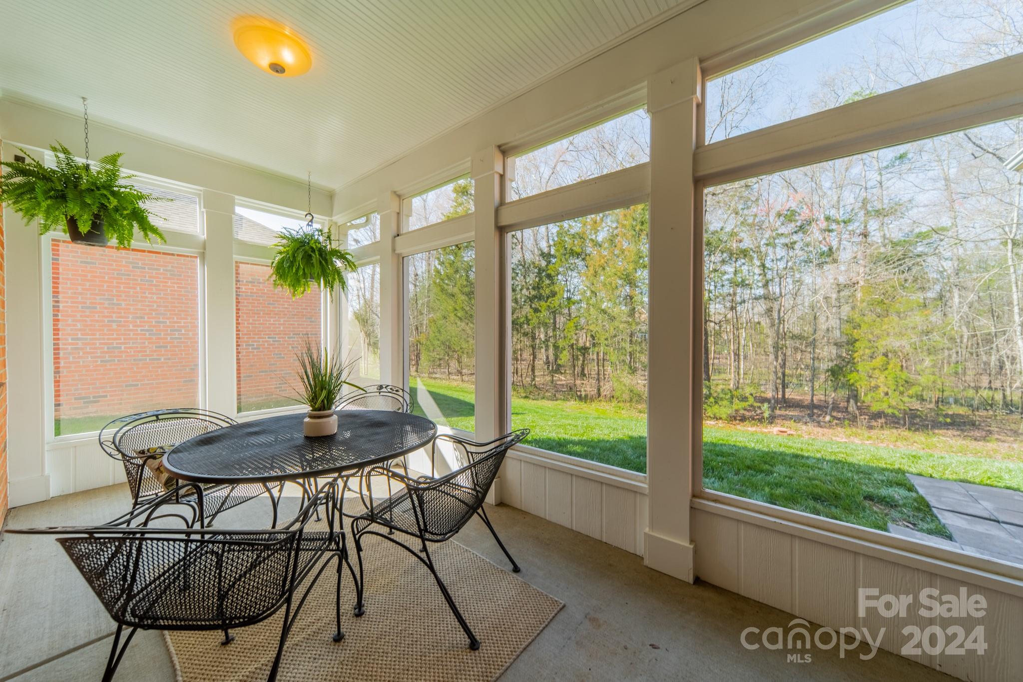 10806 Round Rock Road Charlotte, NC 28277 - Photo 37 of 41 a view of a room with furniture and a yard