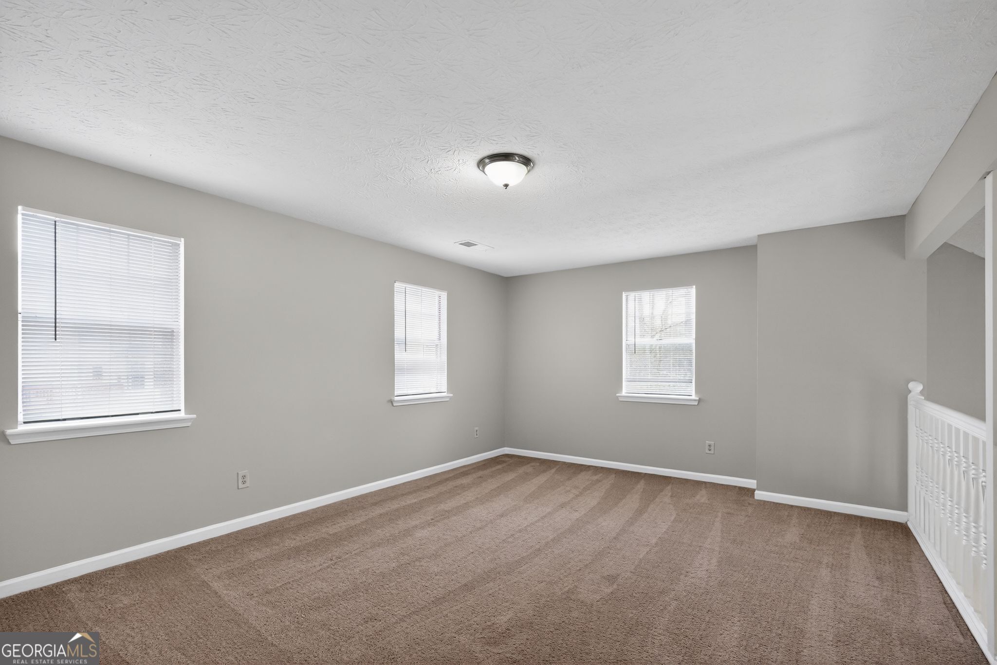 5207 Oaktree Court Lithonia, GA 30038 - Photo 17 of 39 an empty room with a window