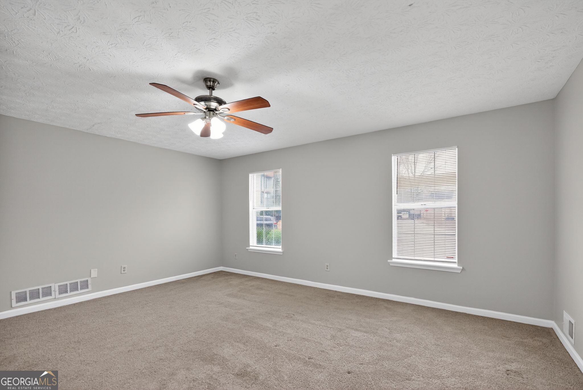 5207 Oaktree Court Lithonia, GA 30038 - Photo 20 of 39 a view of an empty room with a window