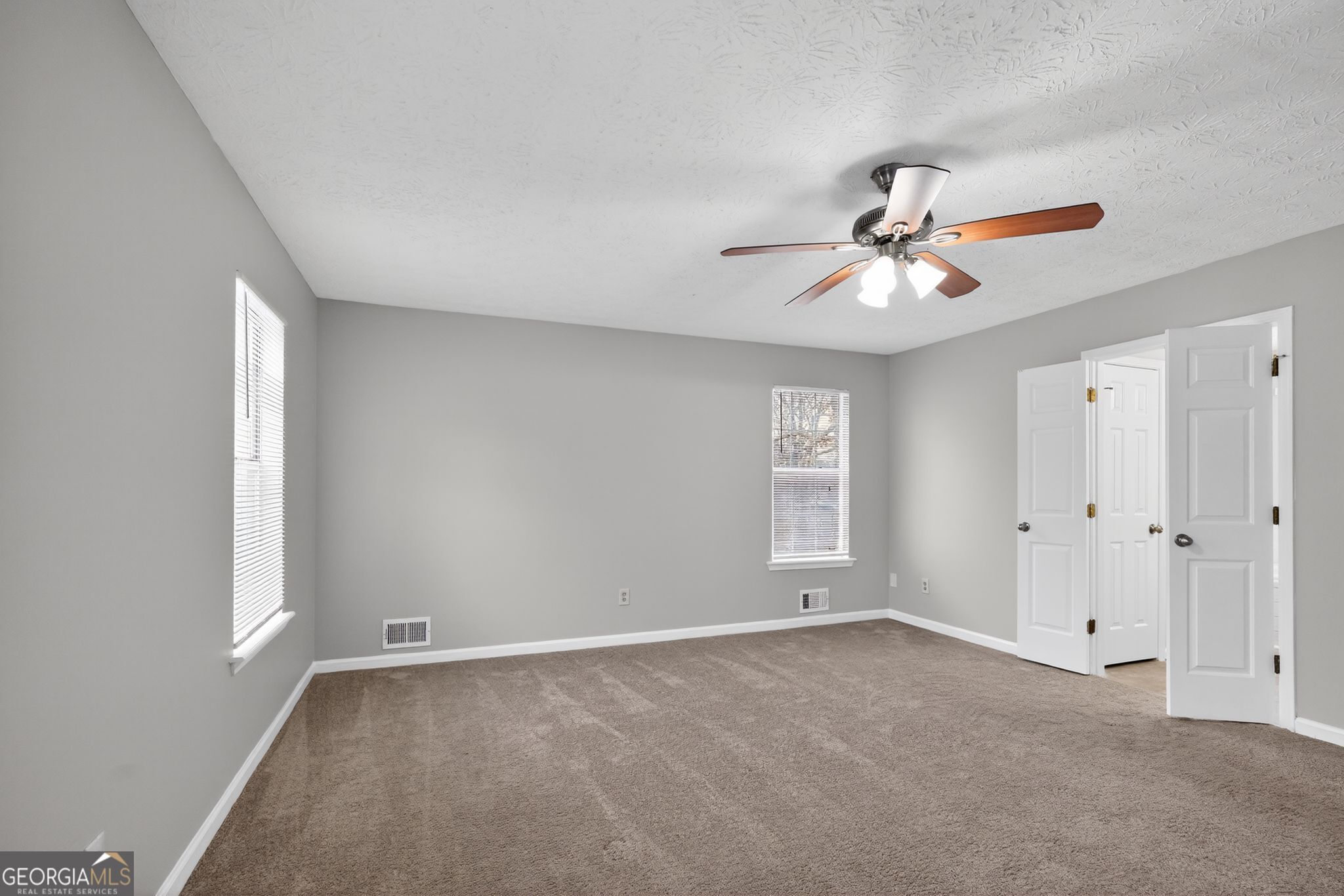 5207 Oaktree Court Lithonia, GA 30038 - Photo 28 of 39 wooden floor in an empty room with a window