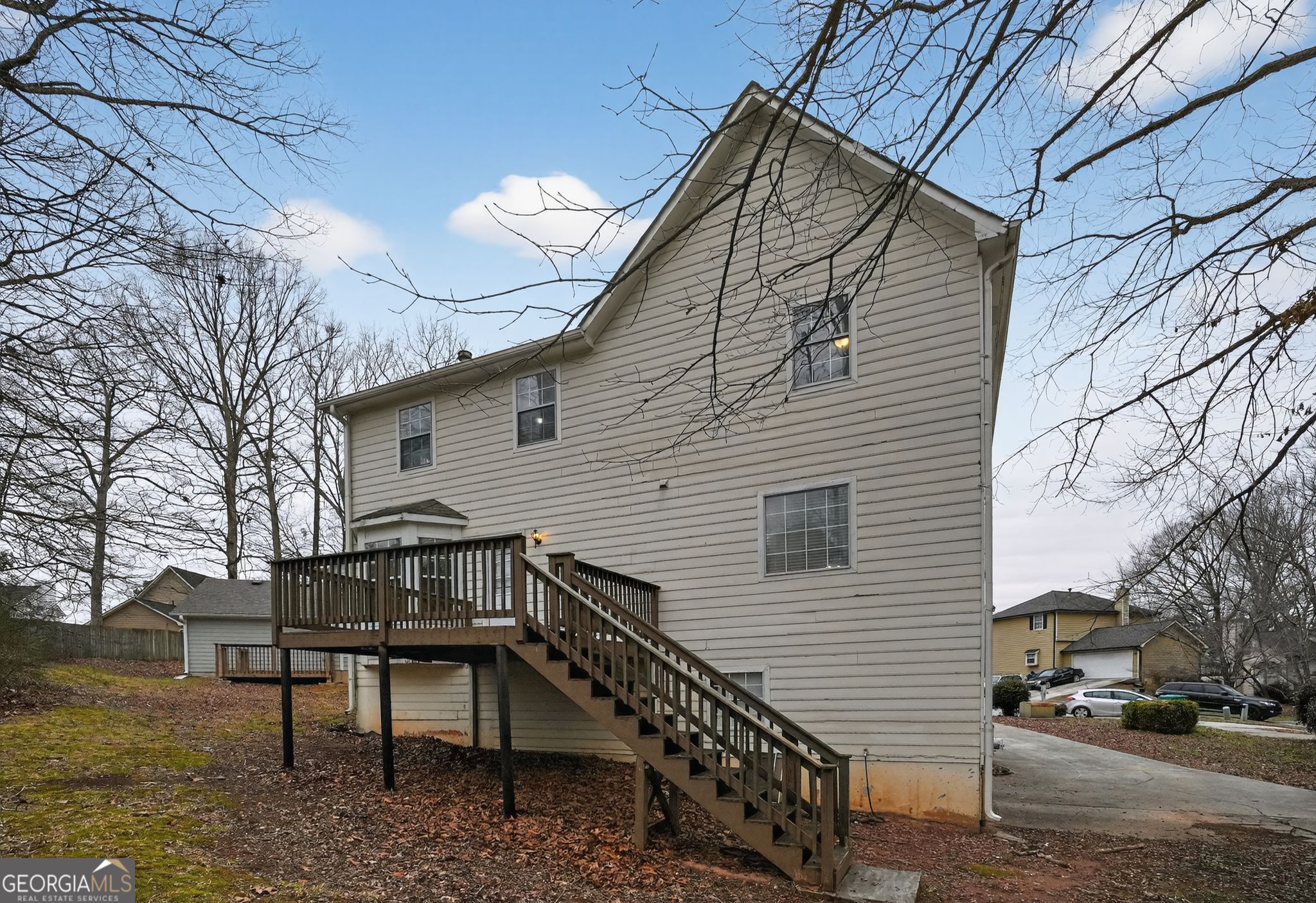 5207 Oaktree Court Lithonia, GA 30038 - Photo 34 of 39 a view of a house with a roof deck