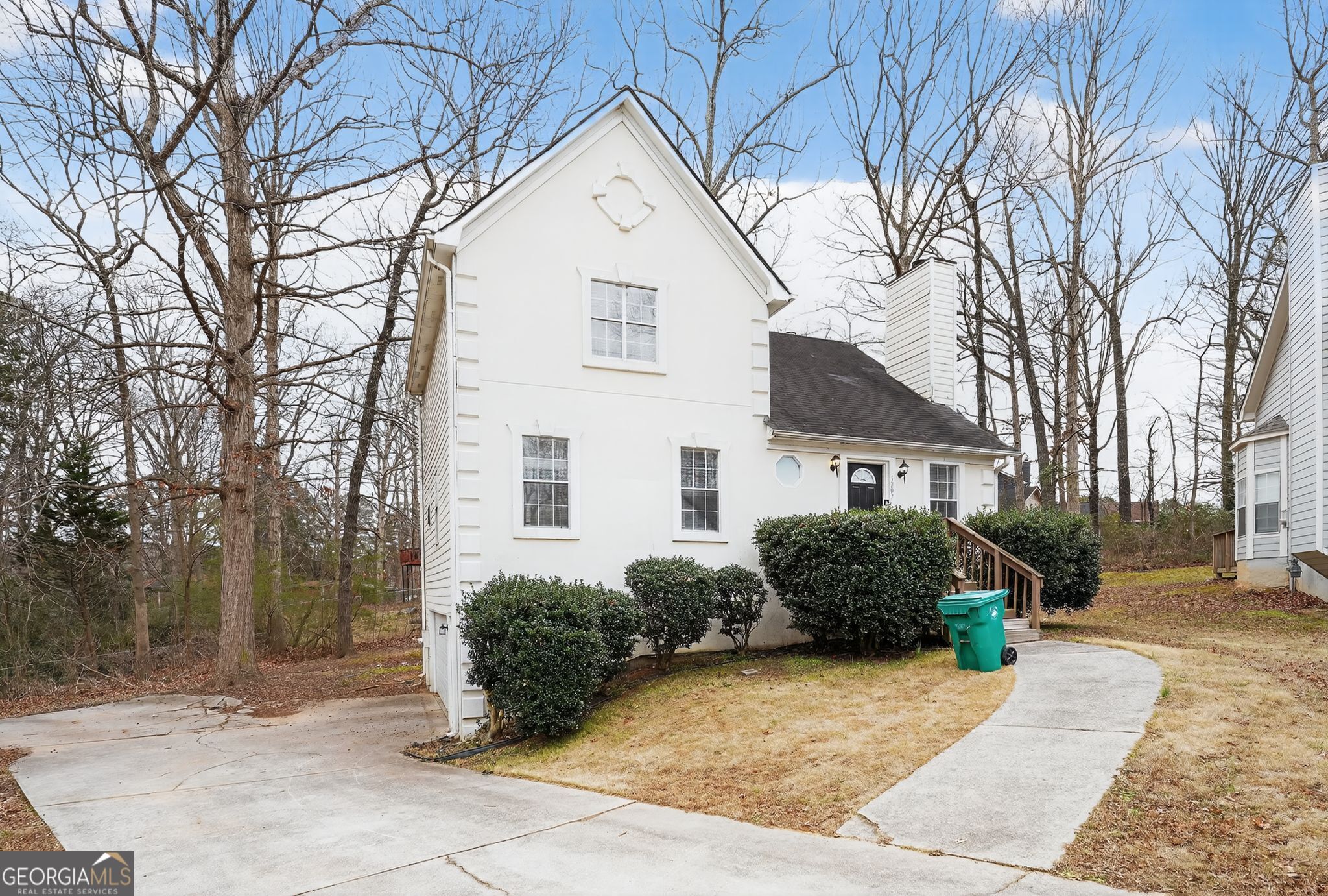 5207 Oaktree Court Lithonia, GA 30038 - Photo 5 of 39 a house view with a outdoor space