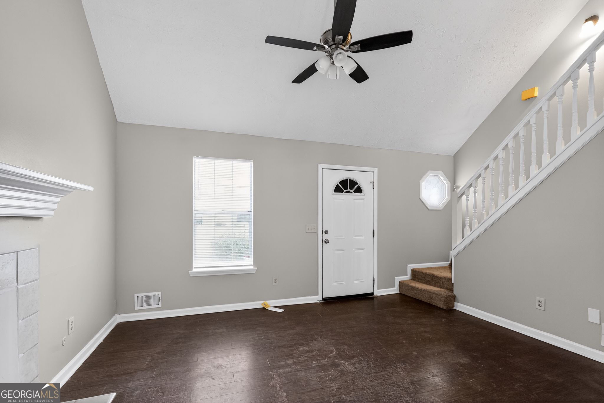 5207 Oaktree Court Lithonia, GA 30038 - Photo 7 of 39 a view of an empty room with a window