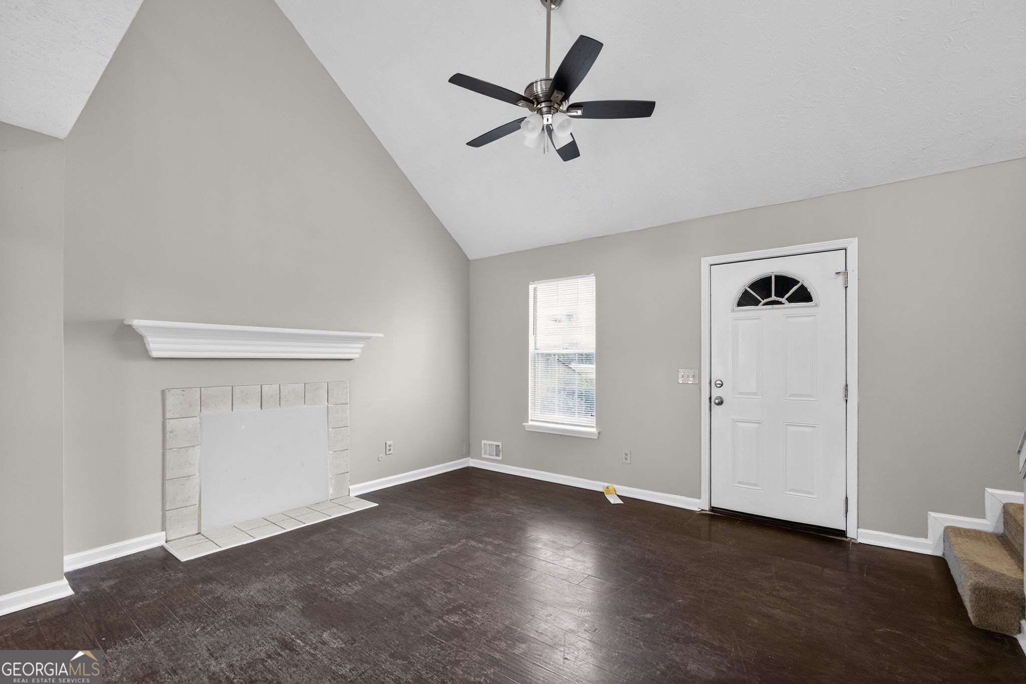 5207 Oaktree Court Lithonia, GA 30038 - Photo 8 of 39 wooden floor in an empty room with a window