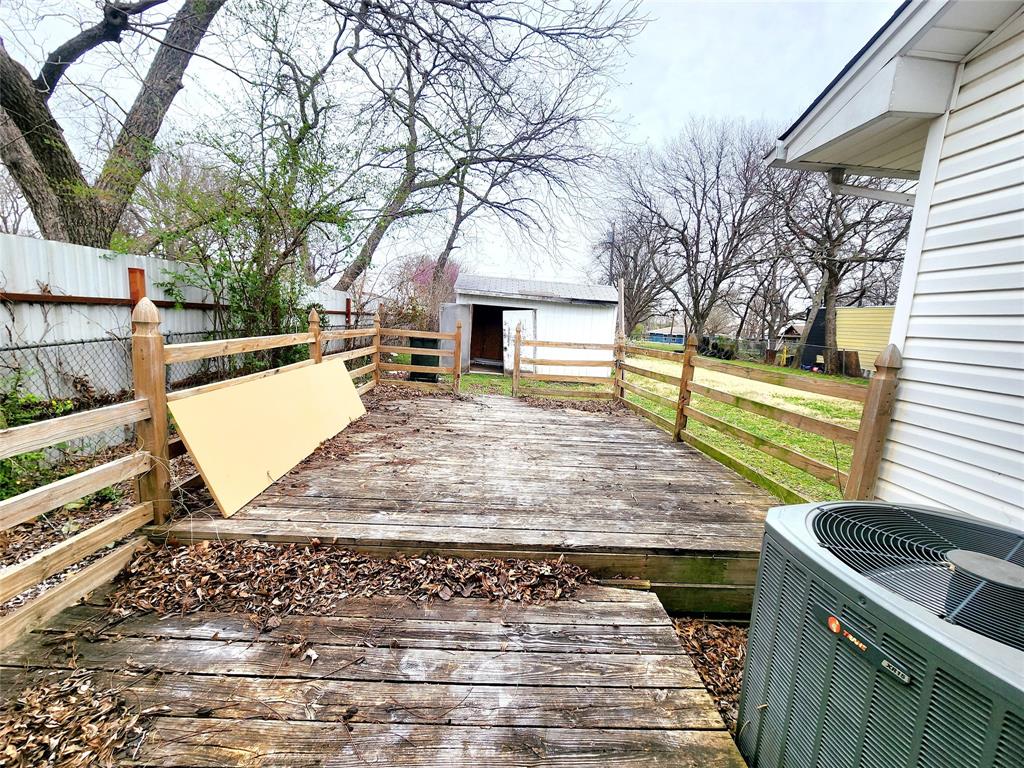 739 South Andrews Avenue Sherman, TX 75090 - Photo 12 of 15 a view of a backyard and a tree