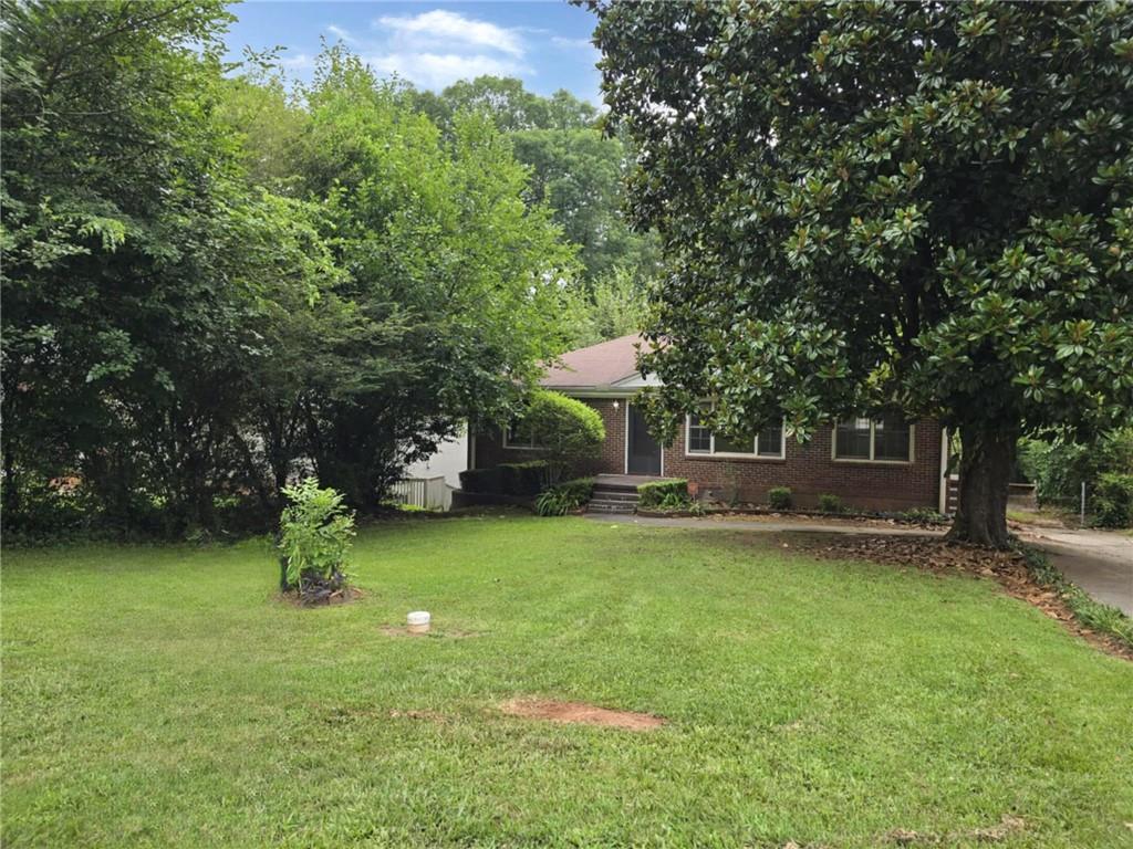 2074 Miriam Lane Decatur, GA 30032 - Photo 1 of 1 a view of a house with a yard porch and sitting area