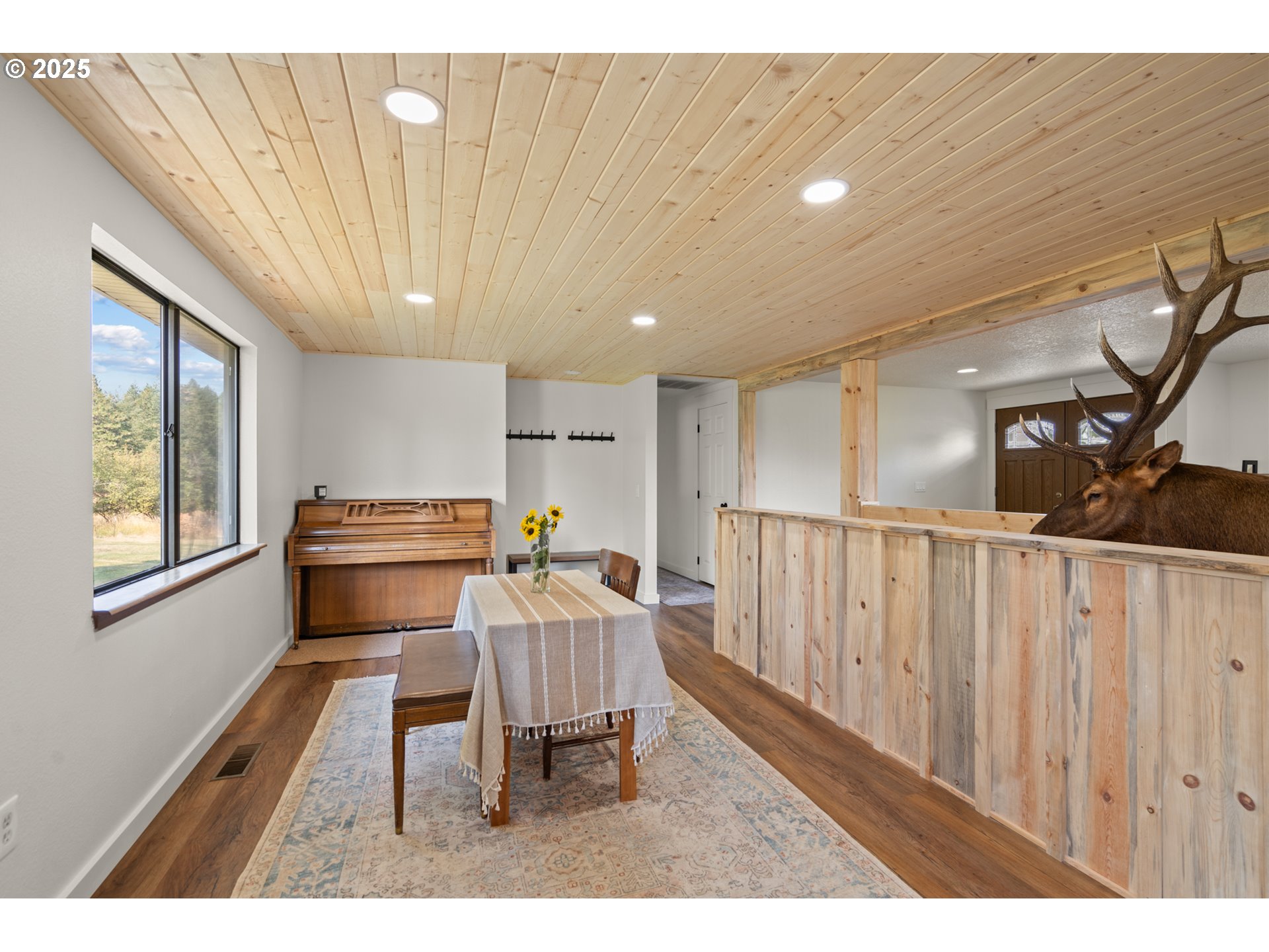 49414 County 1028 Road Pendleton, OR 97801 - Photo 19 of 46 a dinning room with a large window and kitchen view