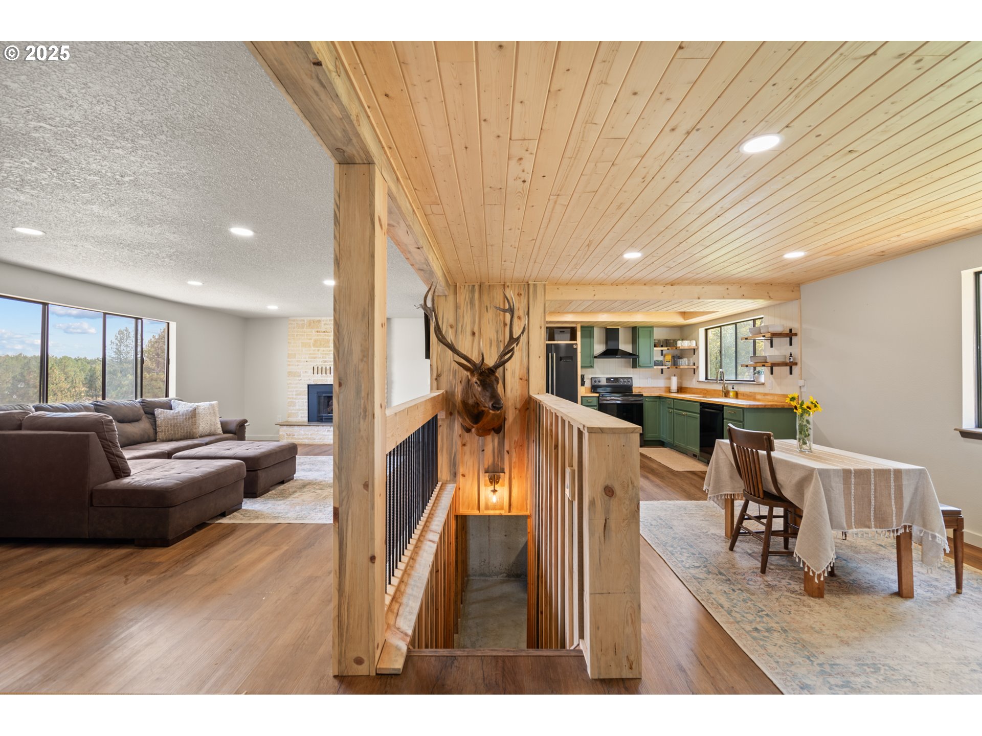 49414 County 1028 Road Pendleton, OR 97801 - Photo 21 of 46 a living room with furniture and a wooden floor