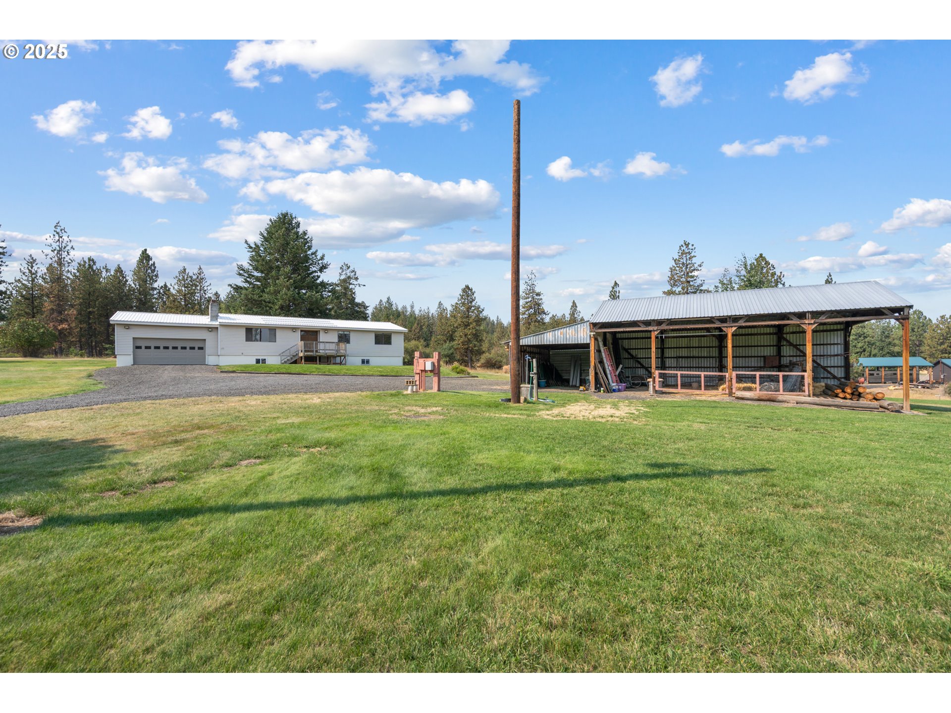 49414 County 1028 Road Pendleton, OR 97801 - Photo 41 of 46 a view of an house with backyard space and balcony