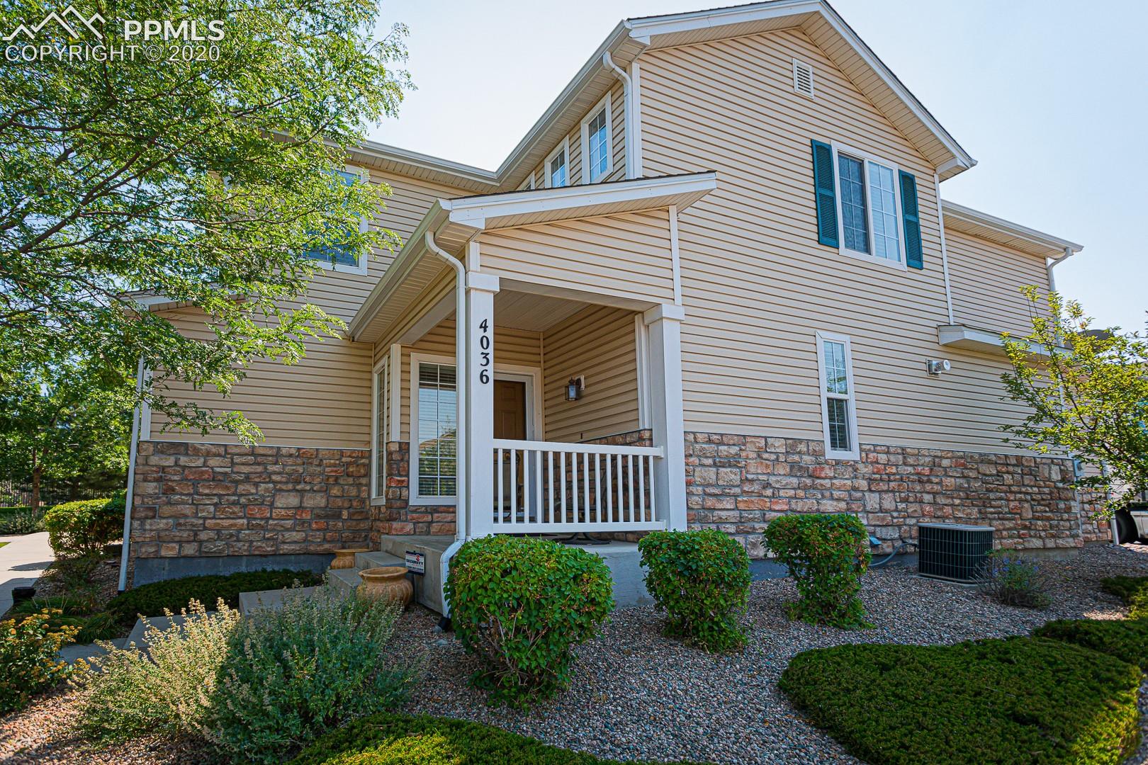 4036 Diamond Ridge View Colorado Springs, CO 80918 - Photo 1 of 39 End unit townhome in Montarbor Villas
