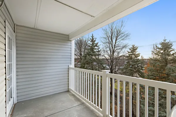 a view of a porch with a yard