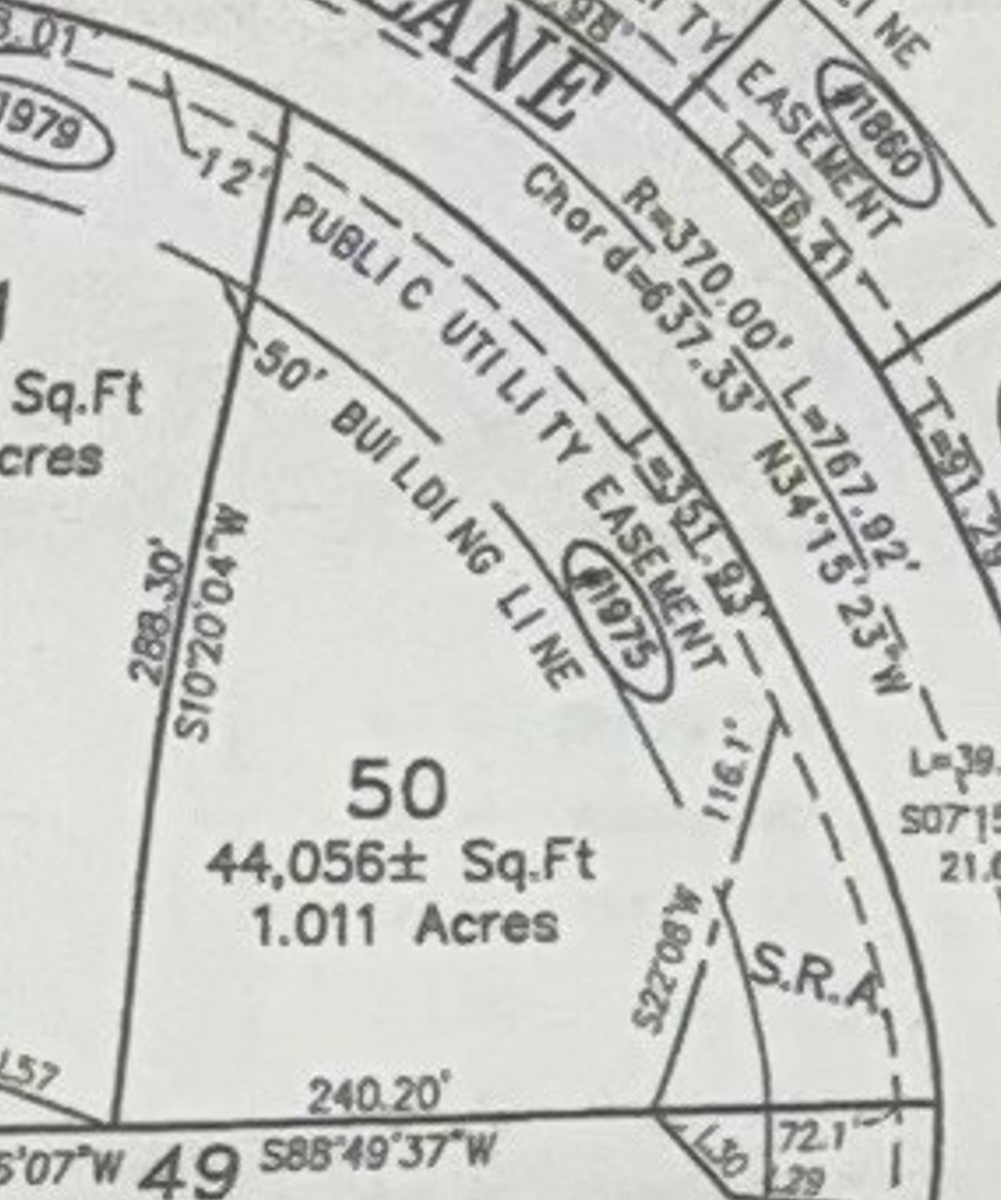 1975 Red Oak Lane Spring Grove, IL 60081 - Photo 2 of 6 a black and white photo of a book