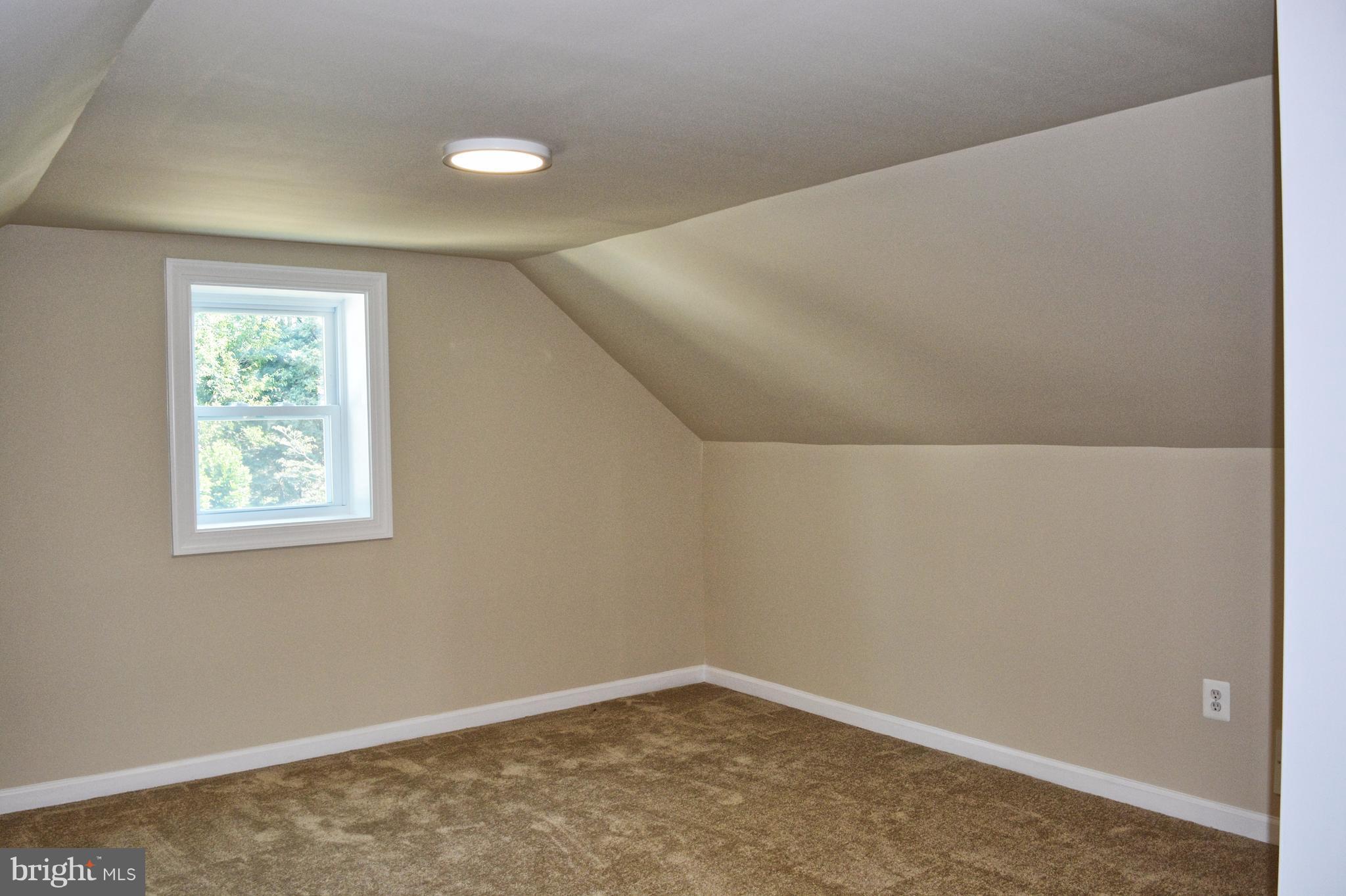 12408 Regwood Road Hydes, MD 21082 - Photo 11 of 17 an empty room with a window