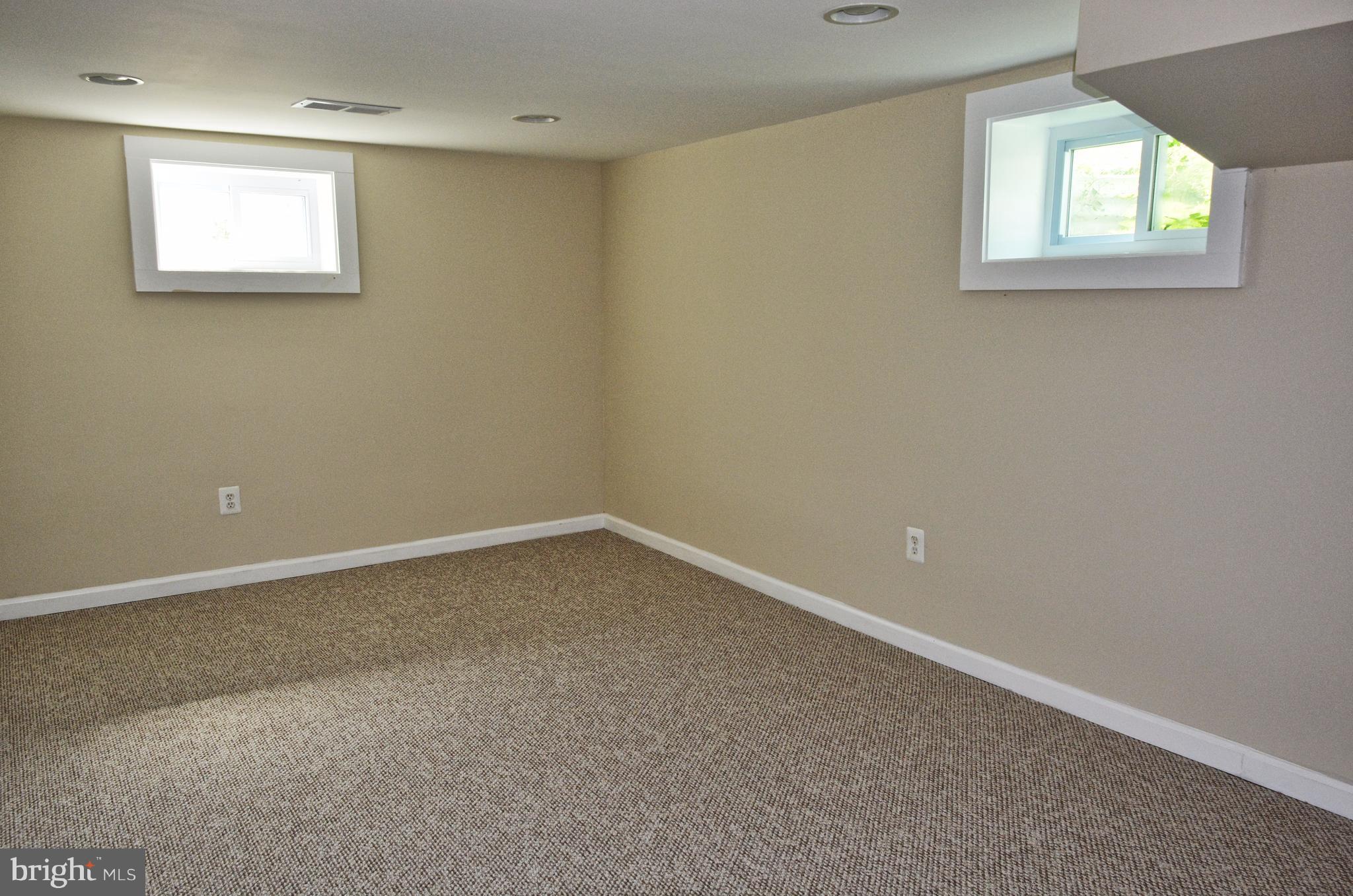12408 Regwood Road Hydes, MD 21082 - Photo 15 of 17 an empty room with a window