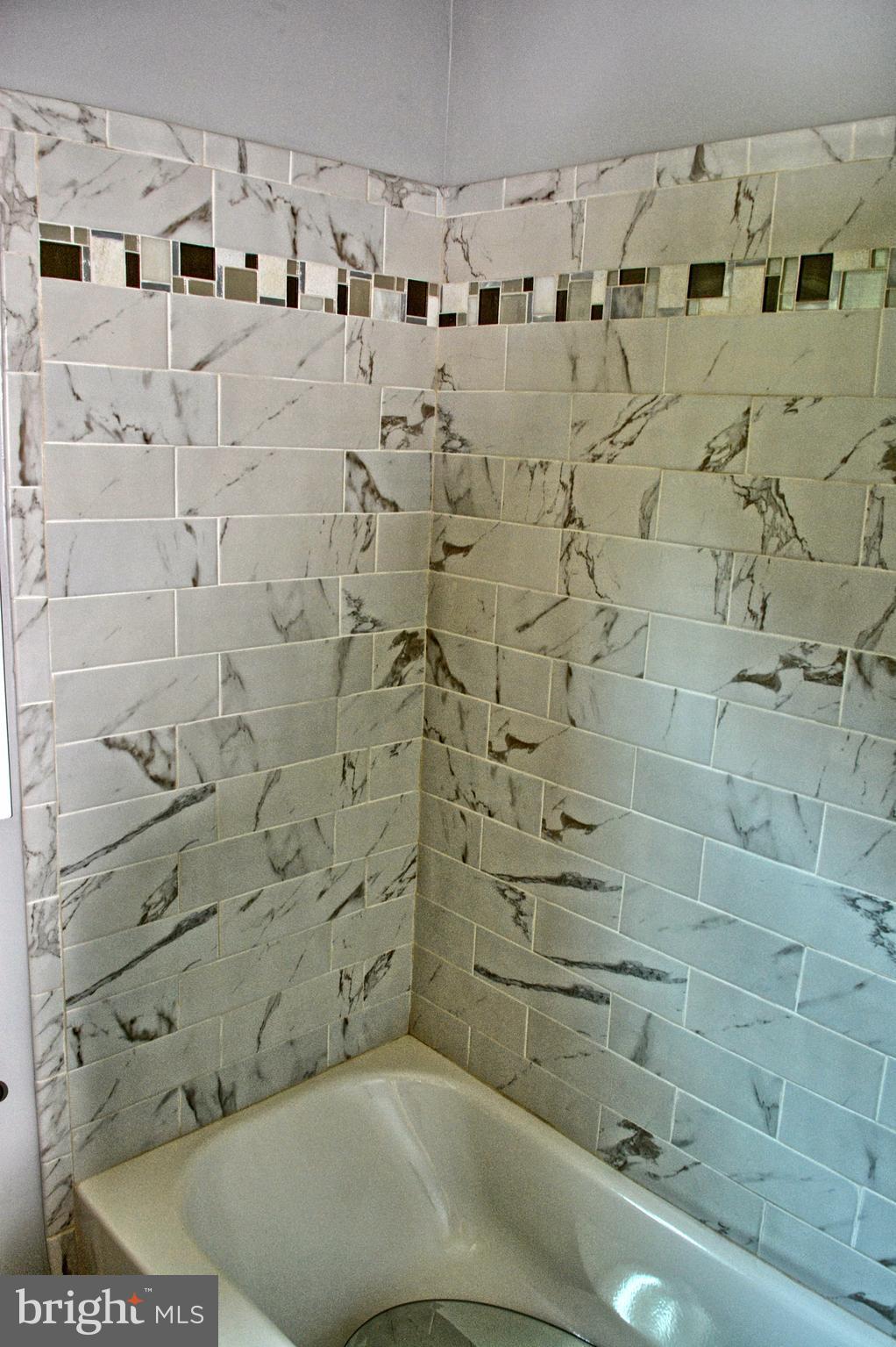 12408 Regwood Road Hydes, MD 21082 - Photo 7 of 17 a bathroom with a shower