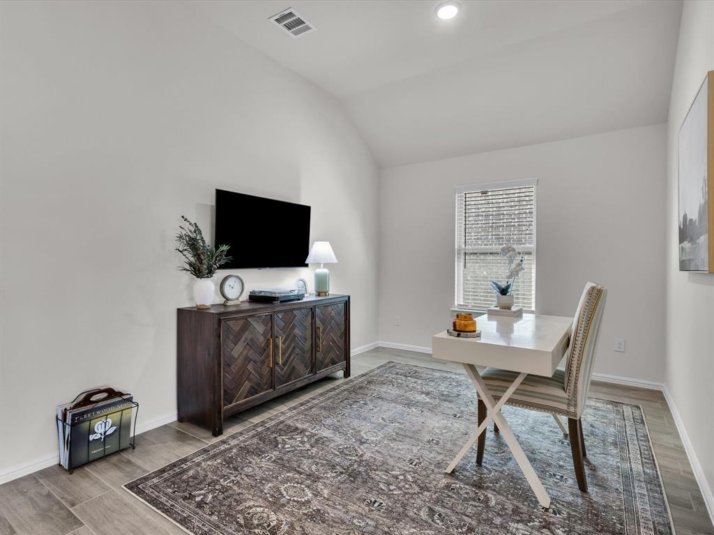 13141 Yellowstone Way Providence Village, TX 76227 - Photo 6 of 40 a view of a workspace with furniture and a window