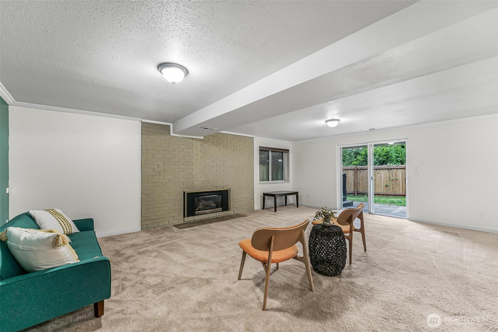 11404 Karshner Road East Edgewood, WA 98372 - Photo 26 of 40 a living room with furniture and a fireplace