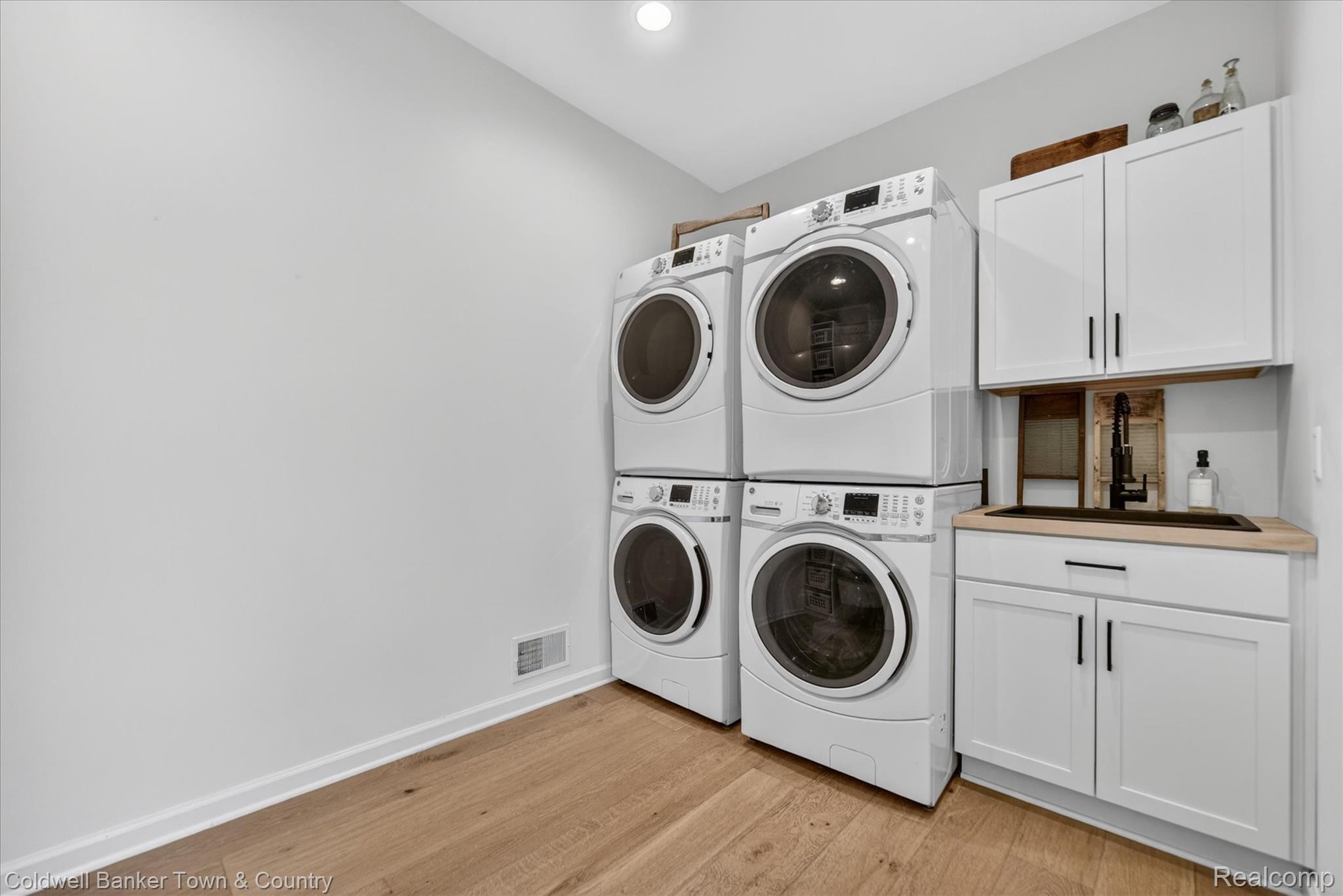918 Gray Fox Court Howell, MI 48843 - Photo 24 of 84 Dedicated laundry room featuring light wood-finish flooring