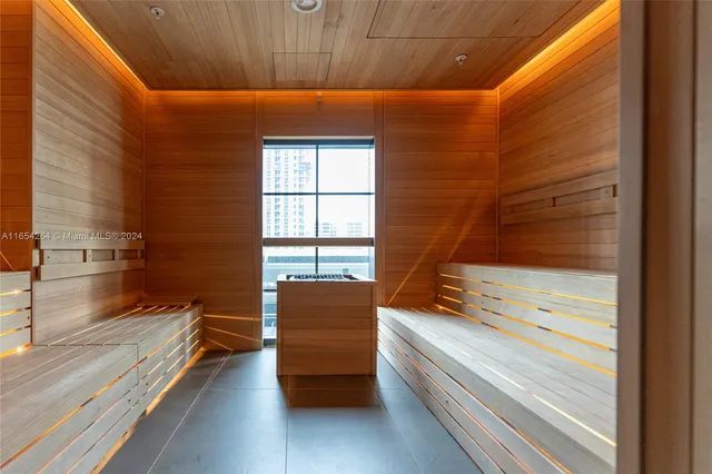 a bathroom with a tub and a shower