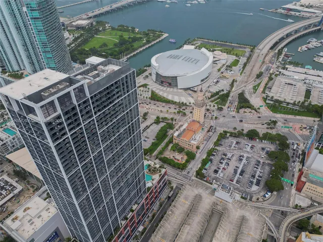 a view of a backyard with sitting area