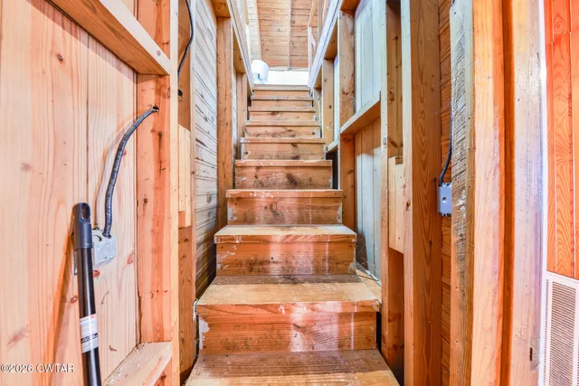 a view of entryway with a front door